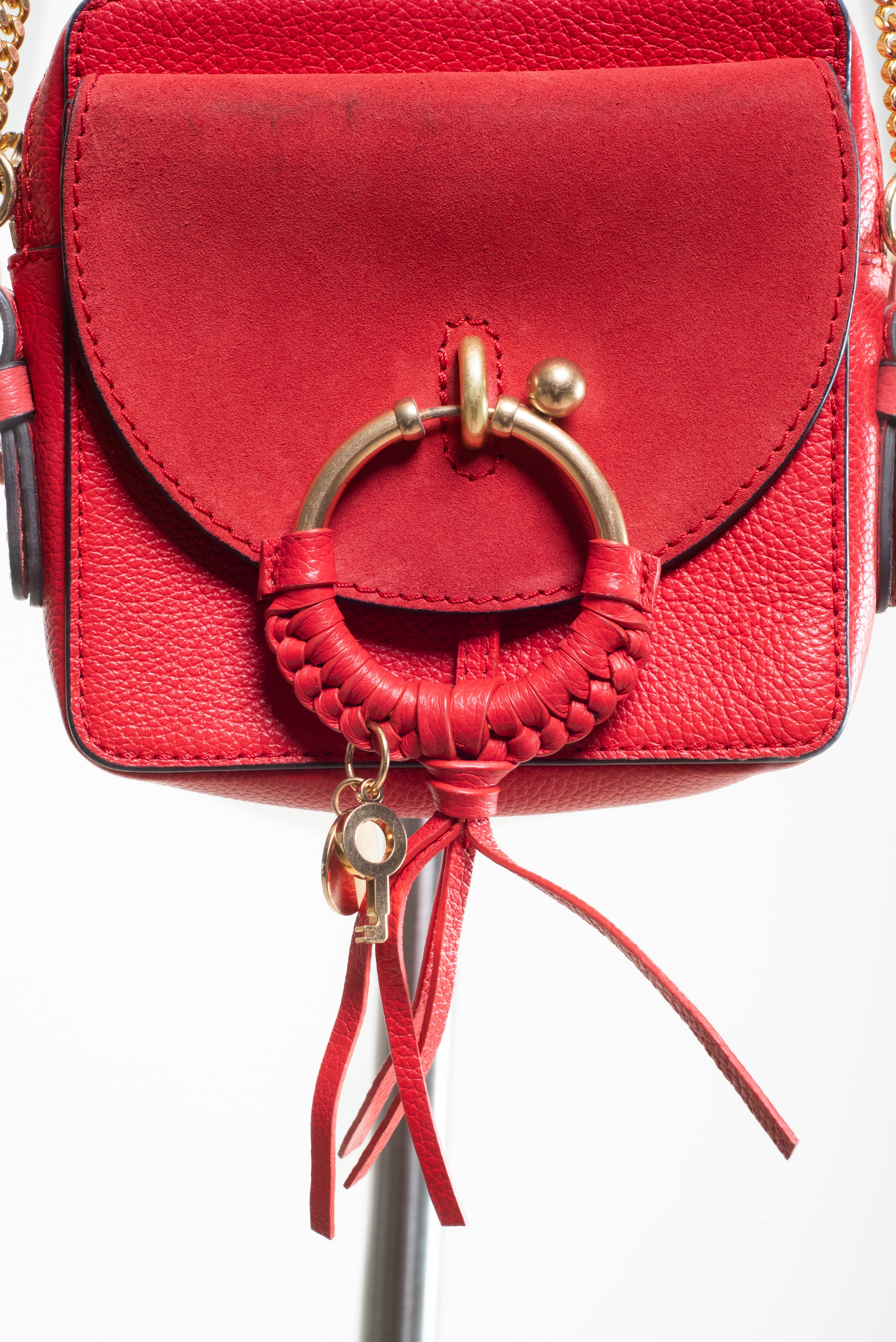 Close-up front view of See by Chloé Small Red Joan Crossbody