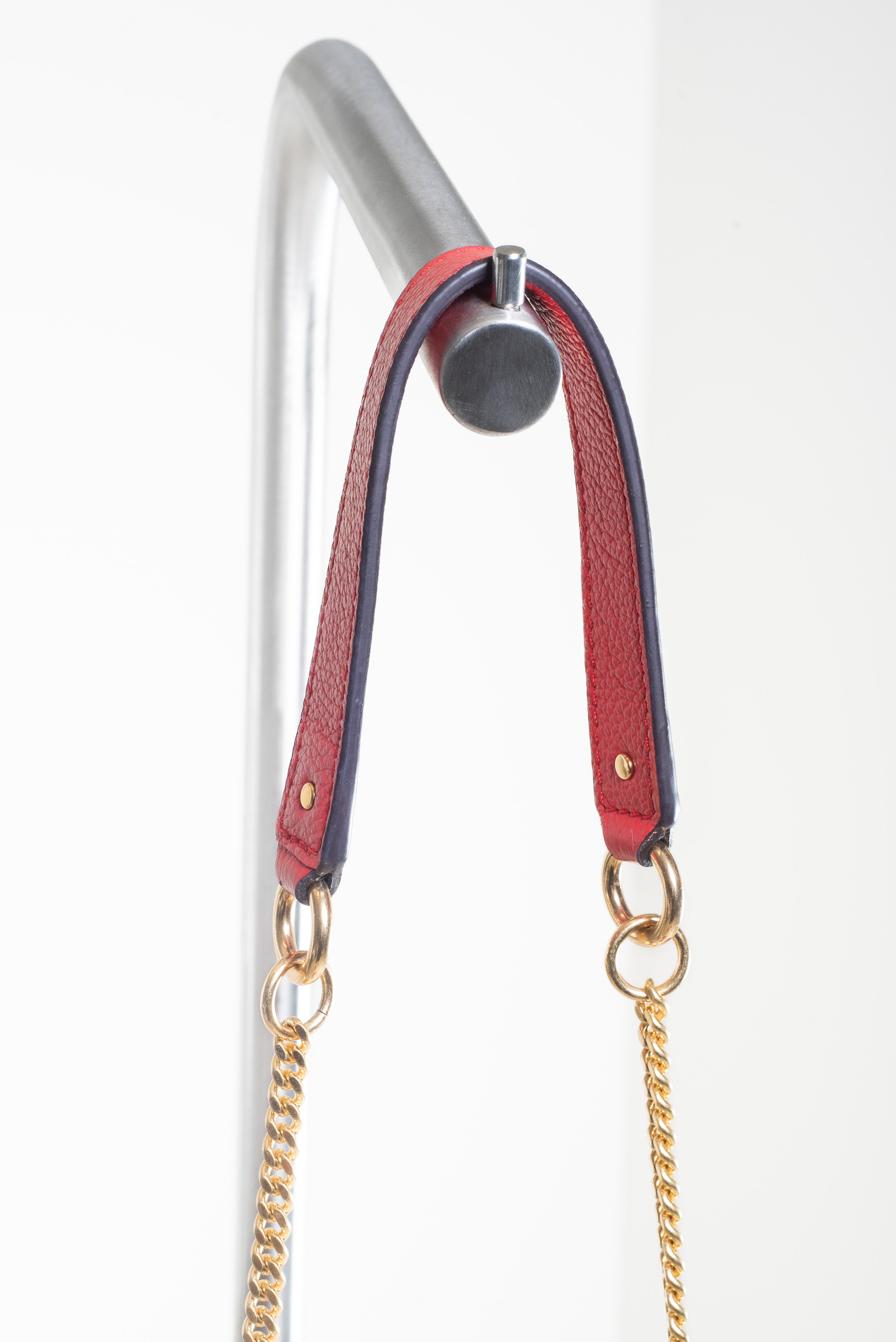 Close-up of adjustable strap and hardware on See by Chloé Small Red Joan Crossbody