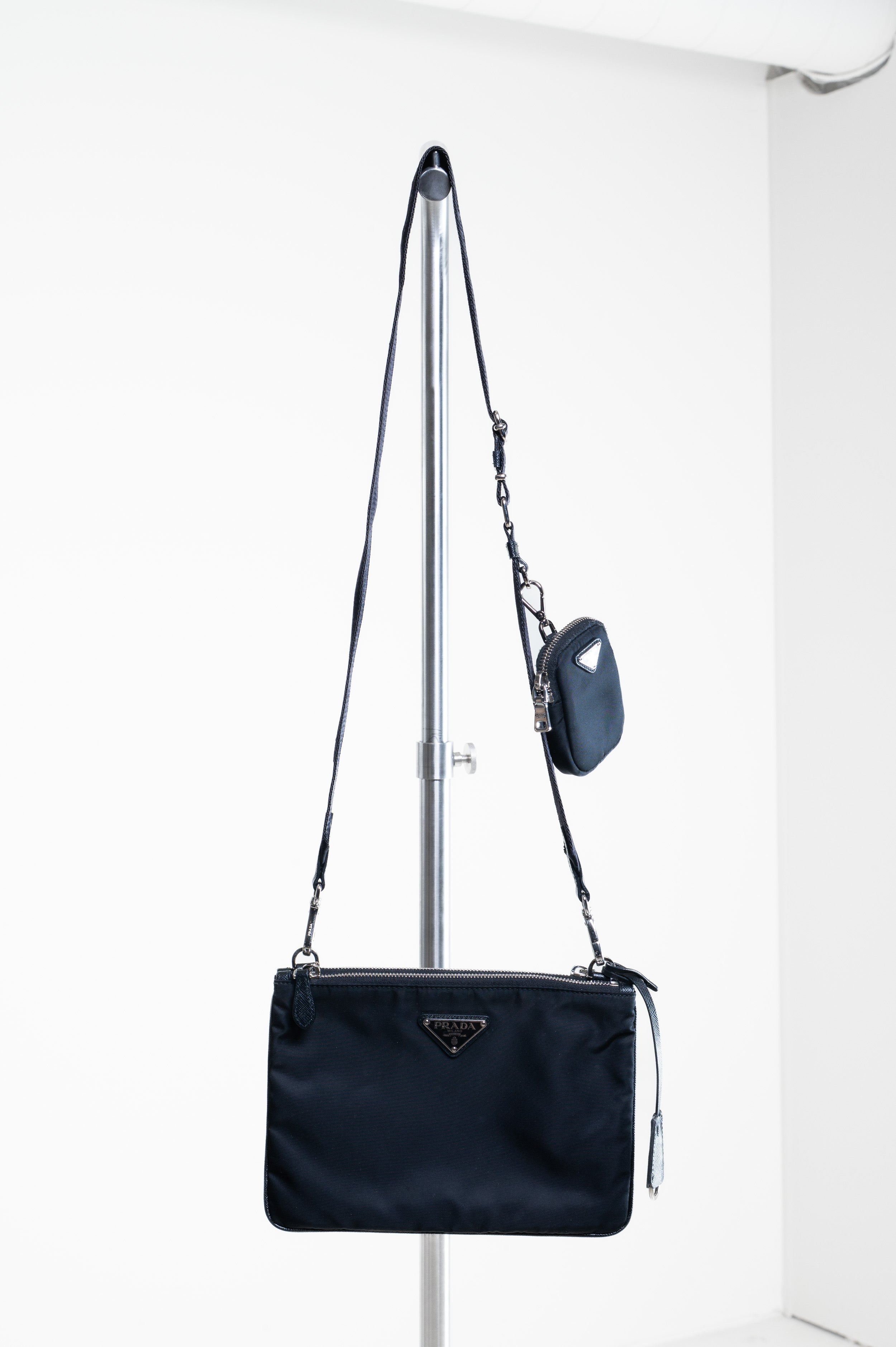 Front view of Prada Black Re-Nylon and Saffiano Crossbody Bag