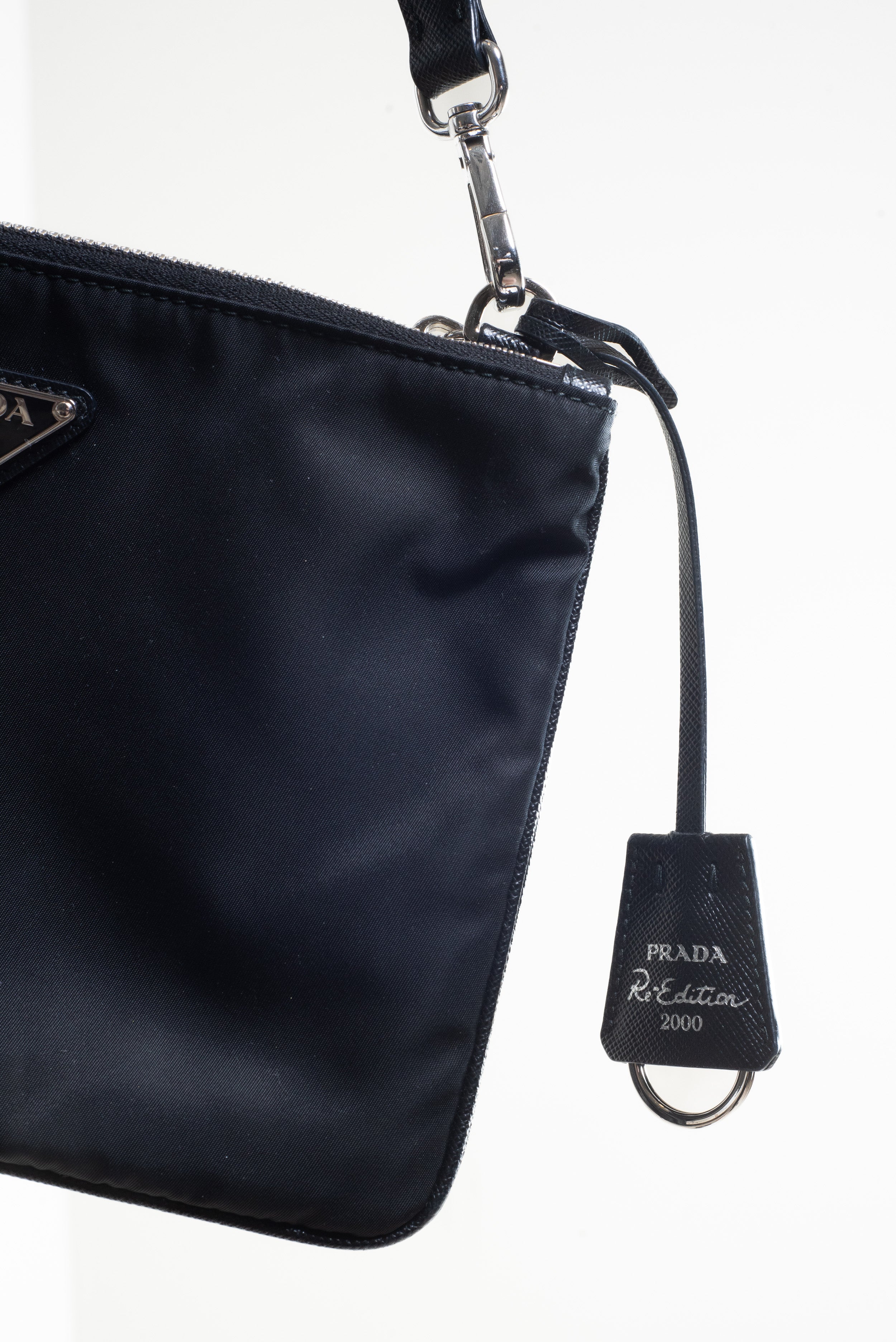 Additional close-up front view of Prada Black Re-Nylon and Saffiano Crossbody Bag