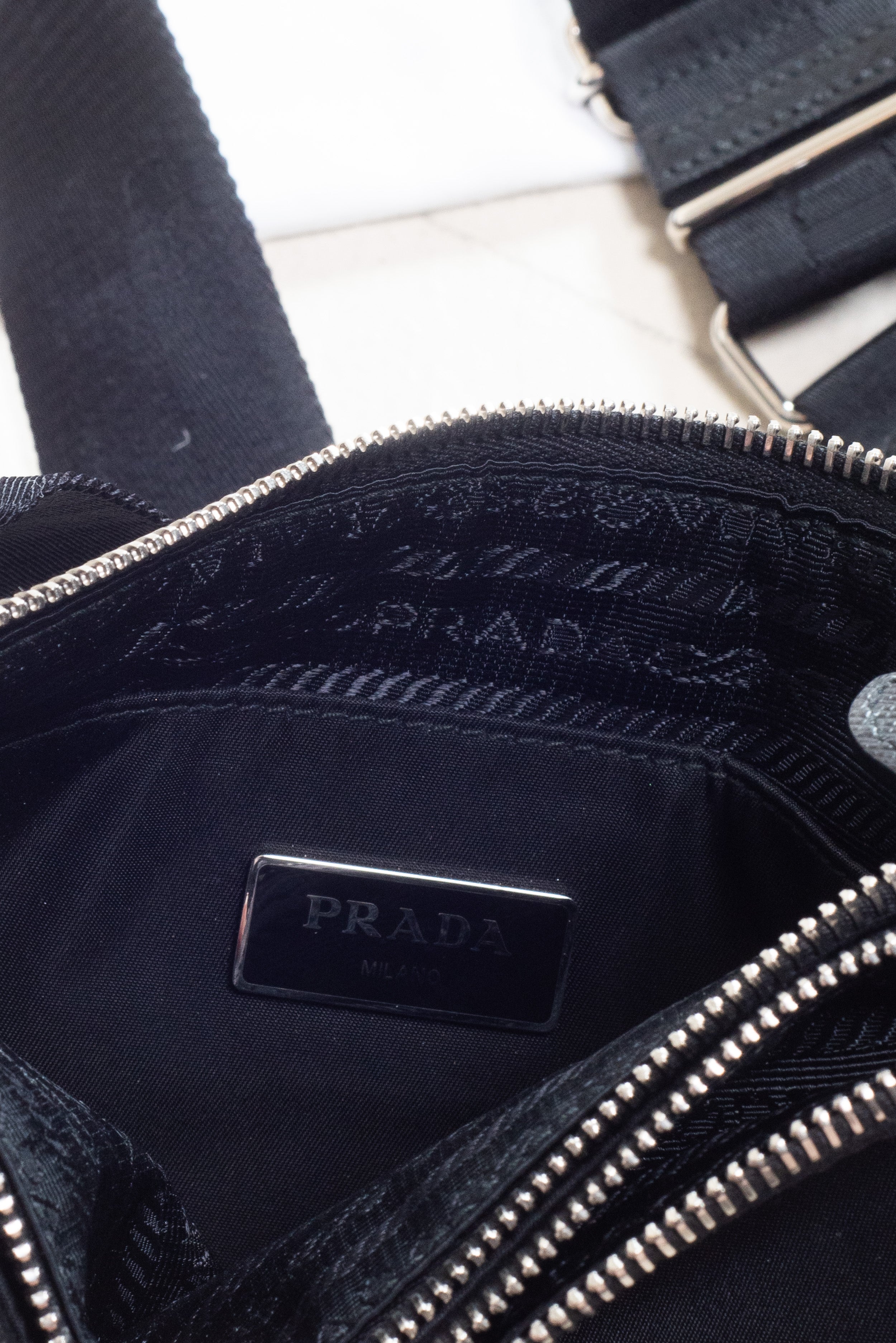 Open top view of Prada Black Re-Nylon and Saffiano Crossbody Bag