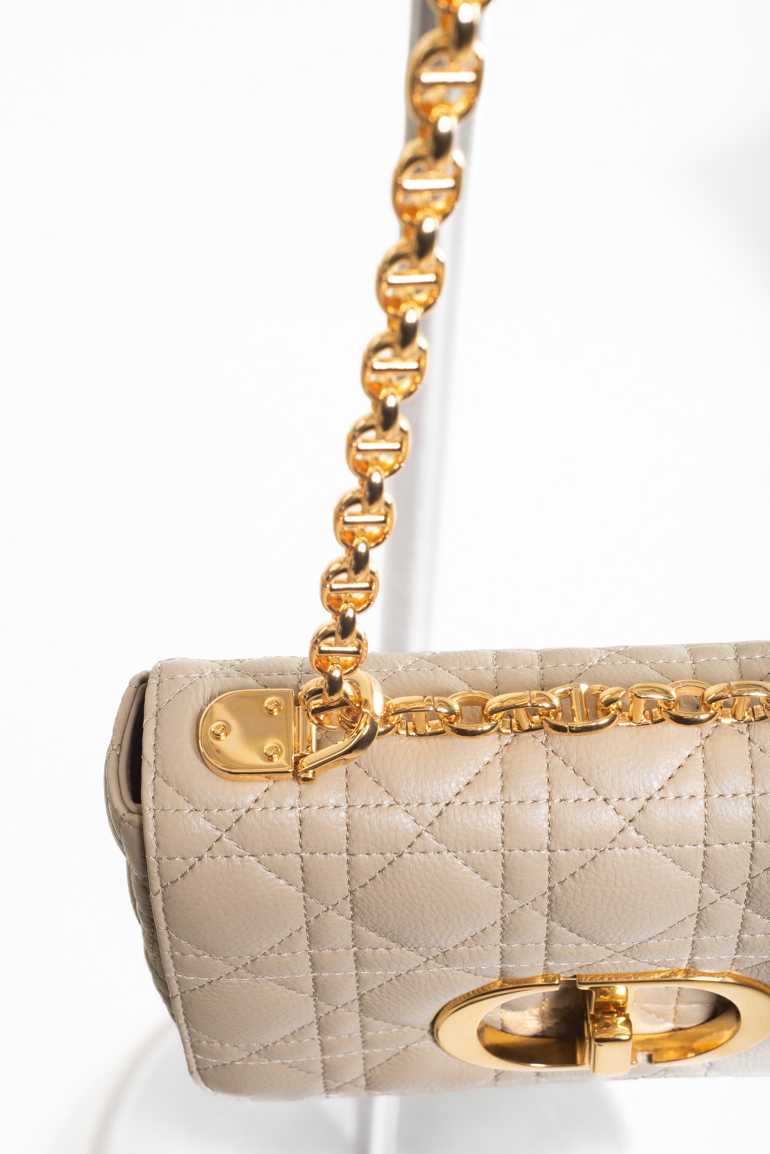 Close-up of adjustable chain strap and metal hardware on Christian Dior Small Beige Cannage Calfskin Caro Bag