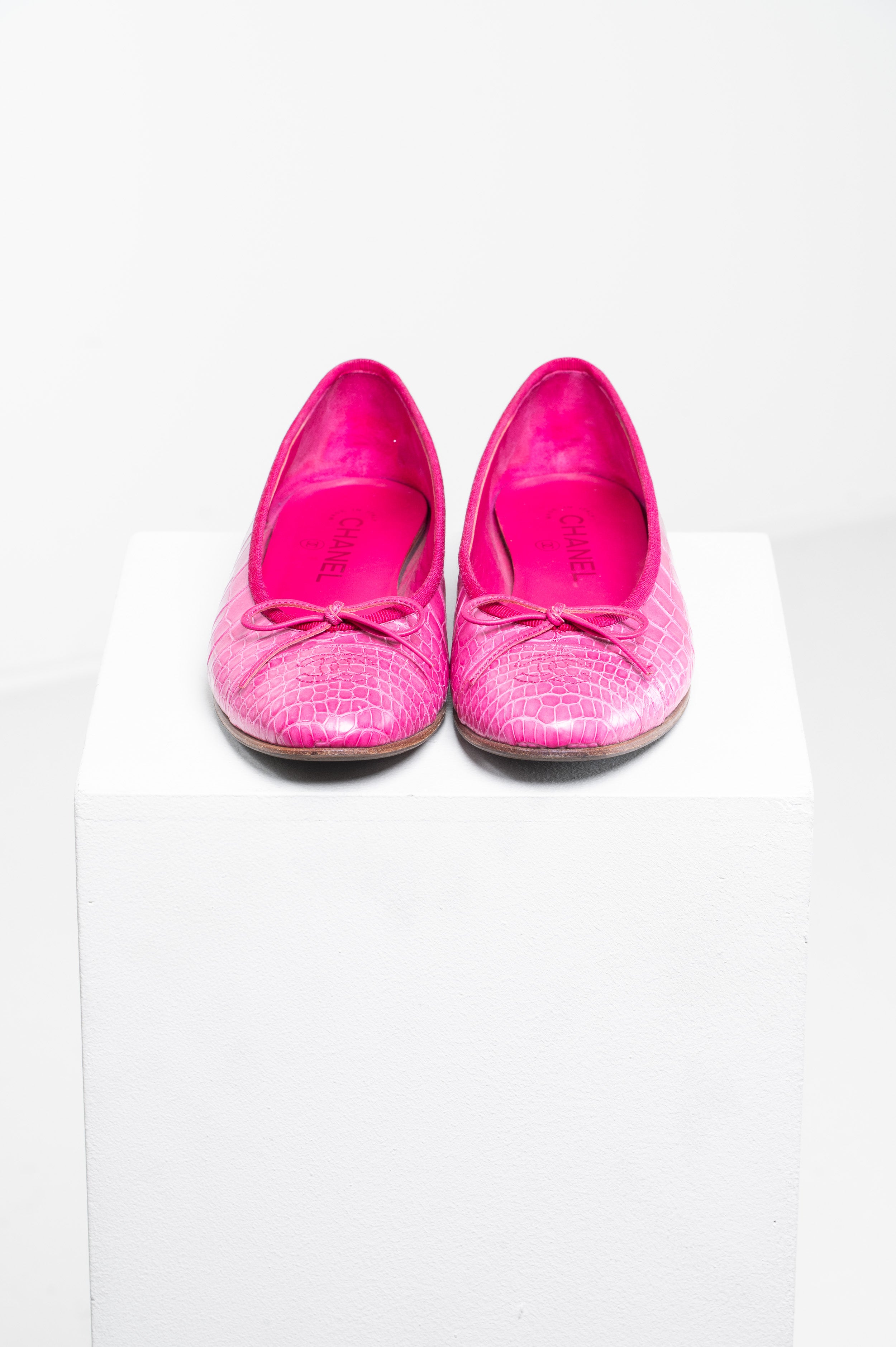 Front view of Chanel Pink Crocodile Ballet Flats 