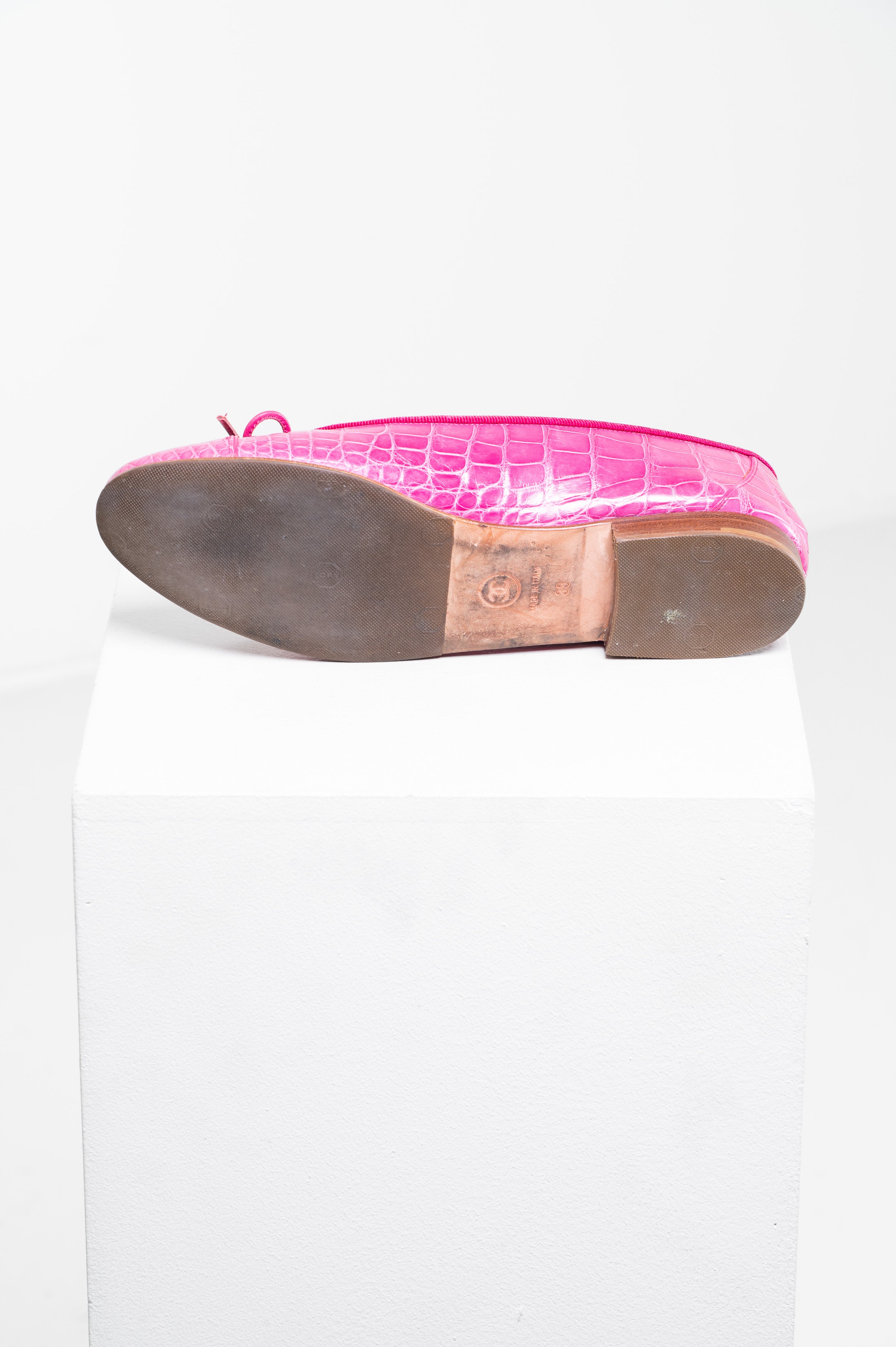Professionally treaded soles of Chanel Pink Crocodile Ballet Flats