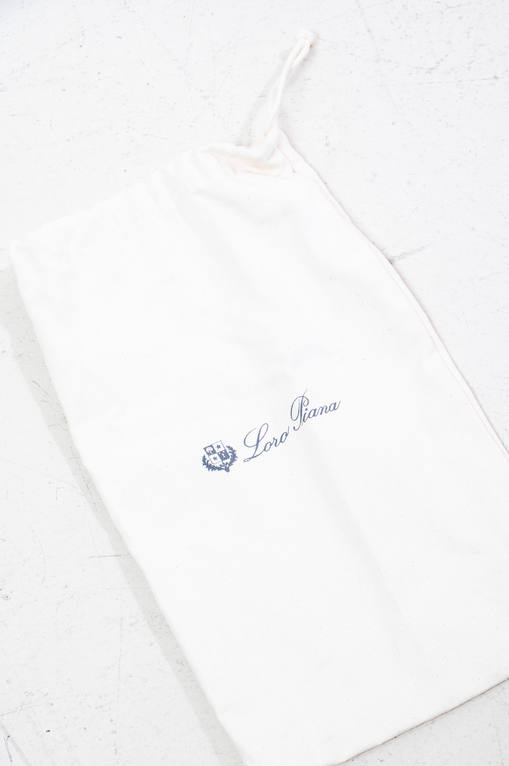 Dust bag of Loro Piana White Ostrich Top Handle Zip Bag