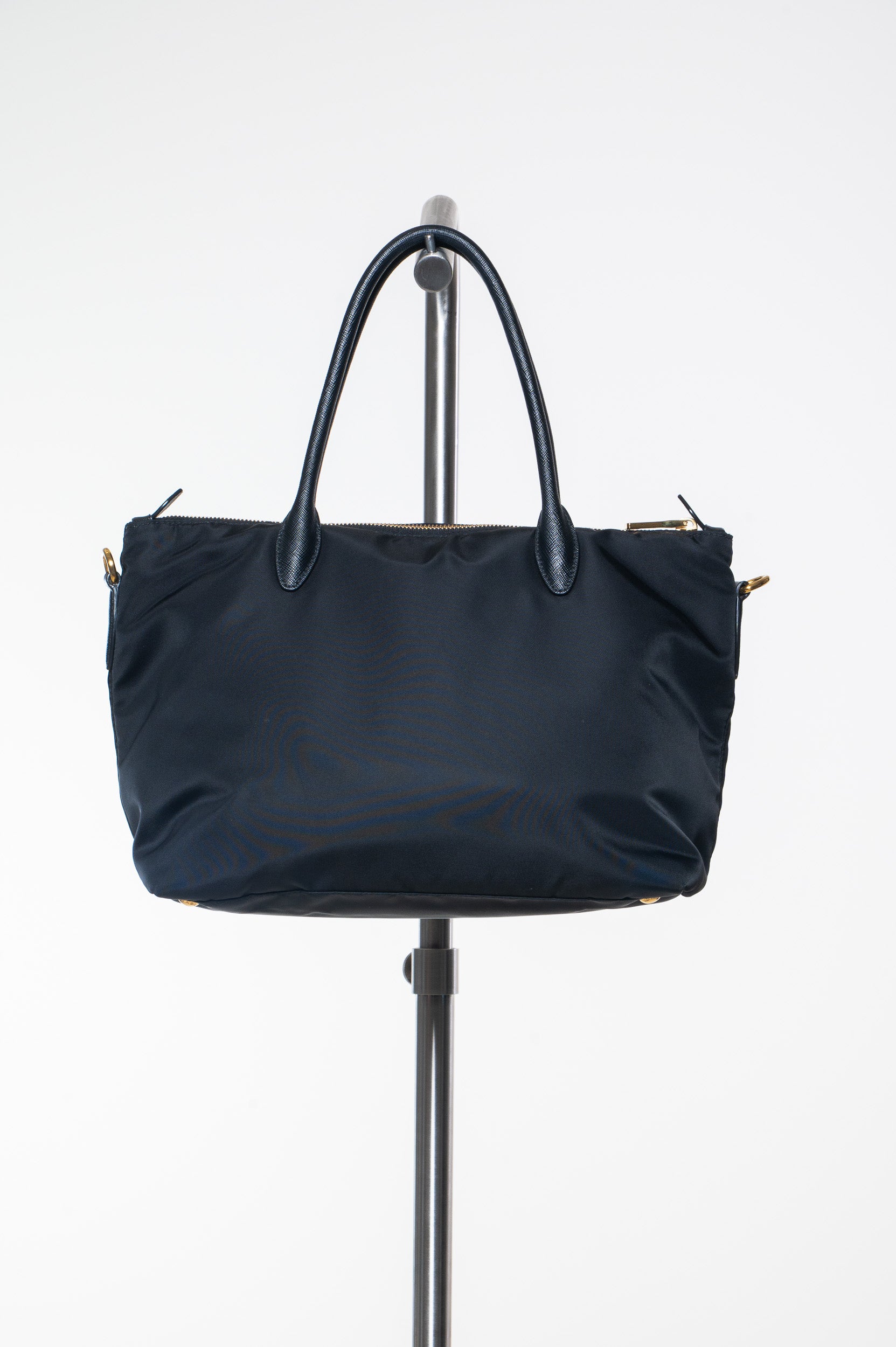 nylon black triangle logo bag