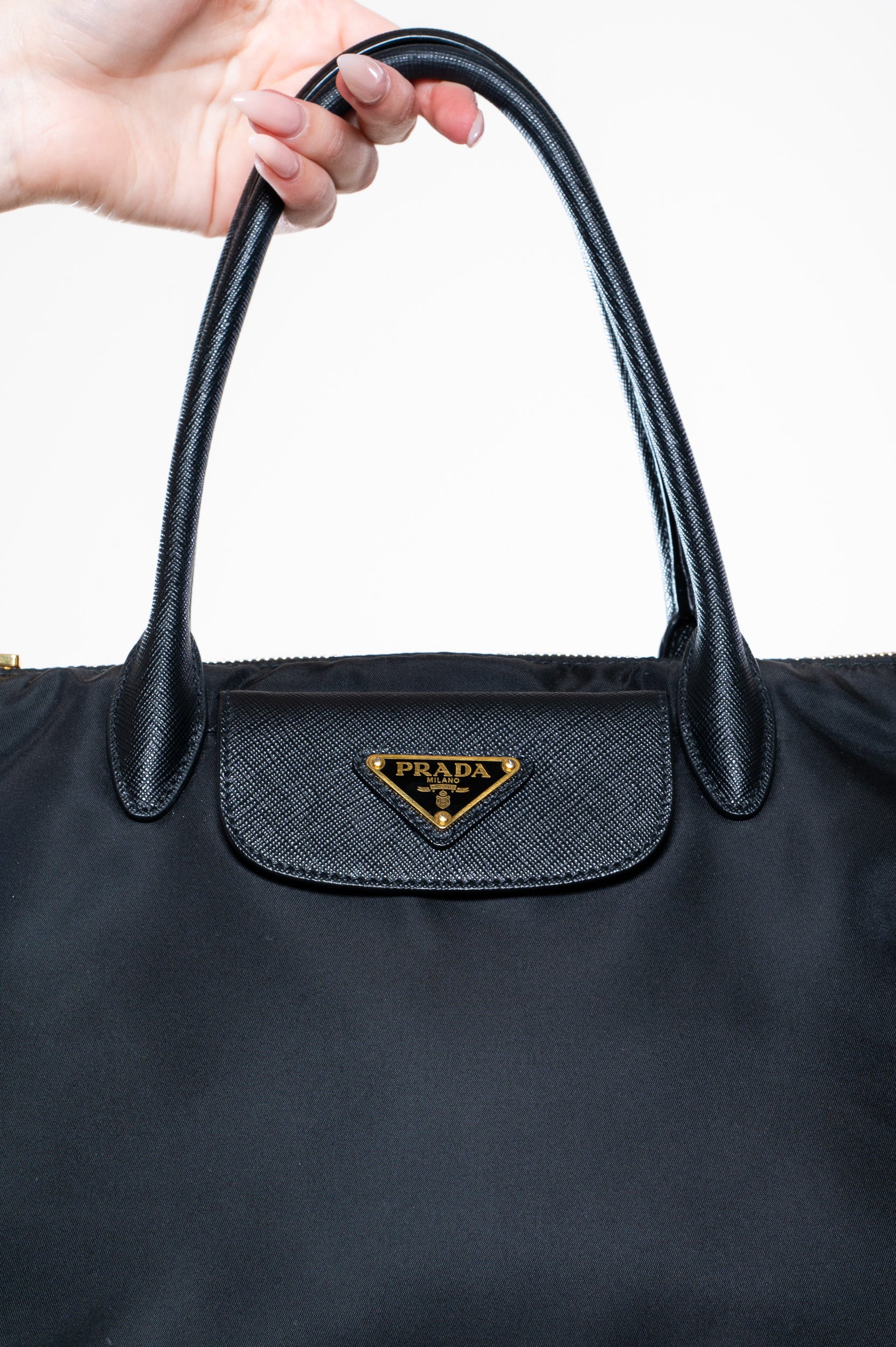 nylon black triangle logo bag