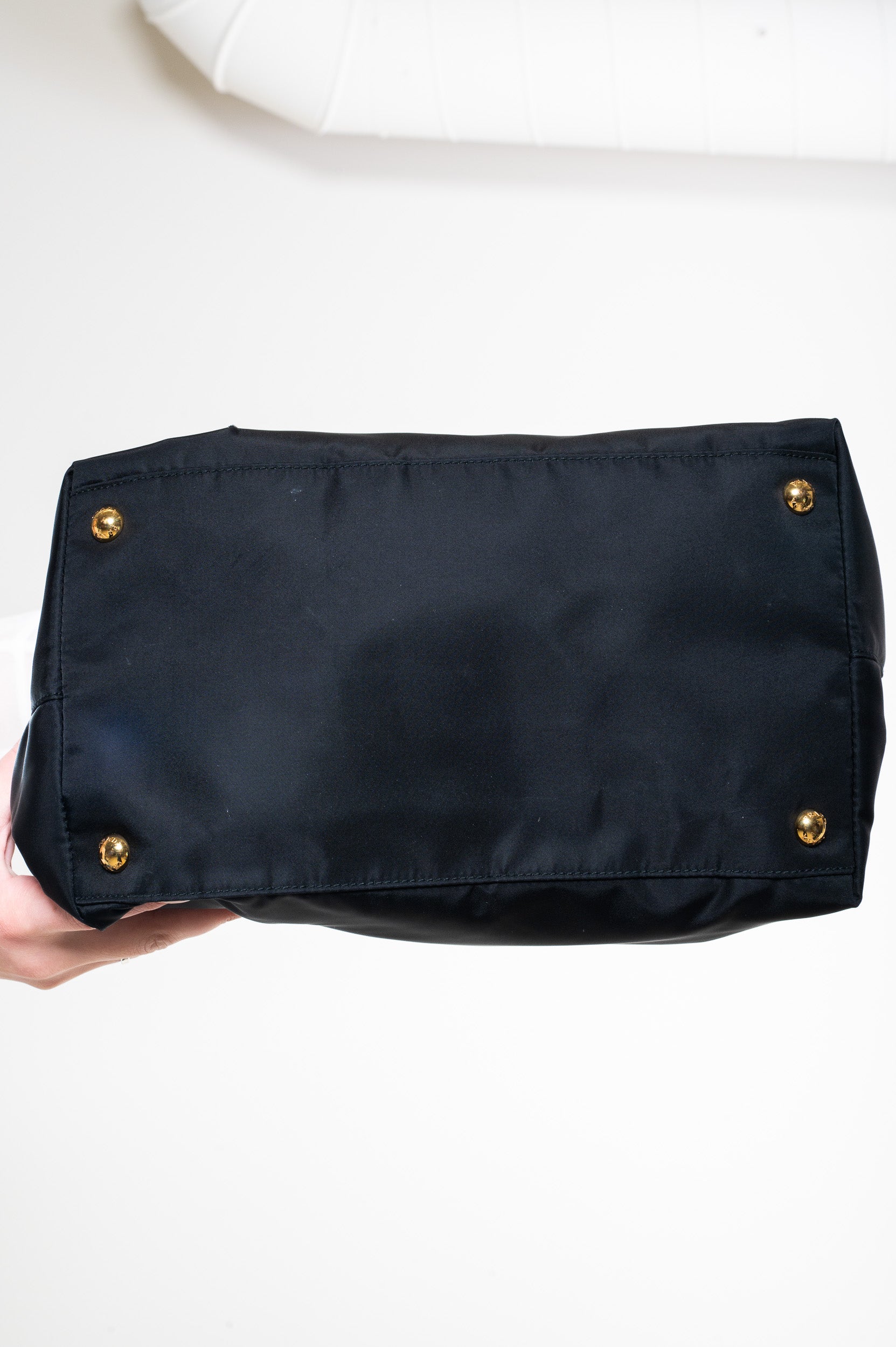 nylon black triangle logo bag
