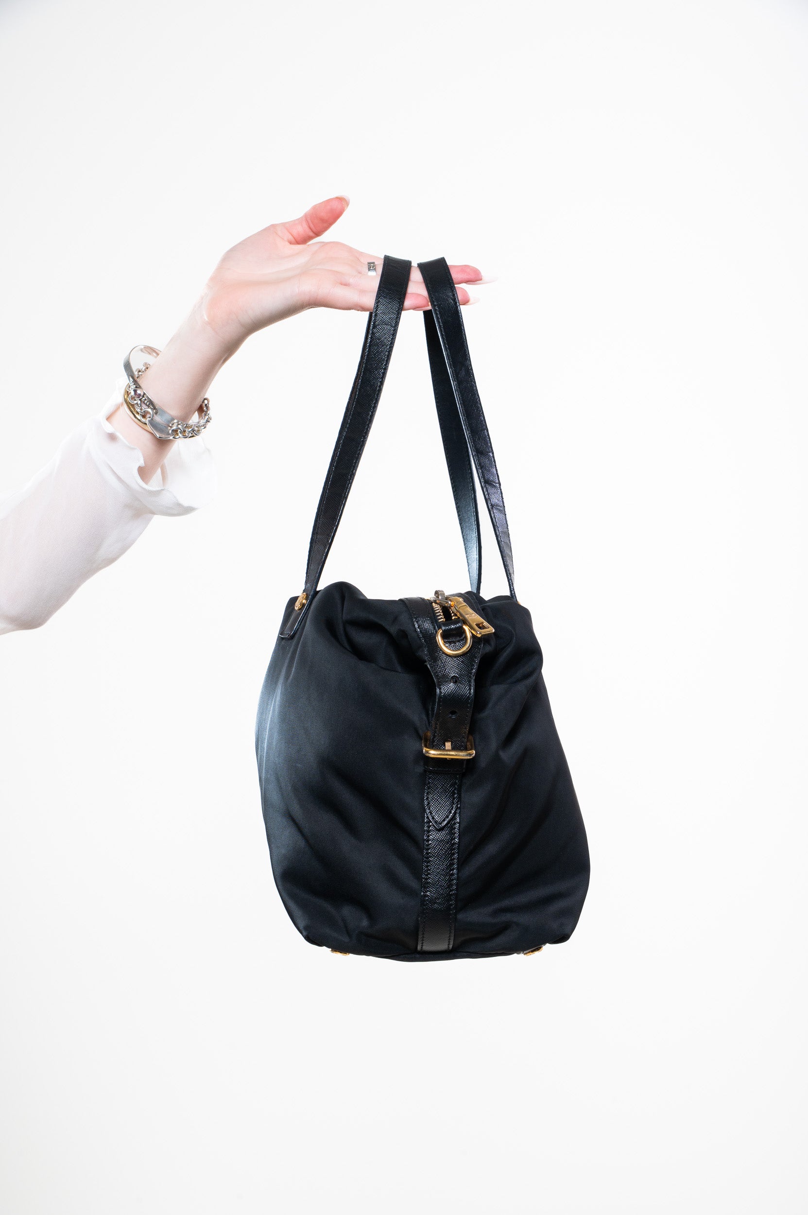 Side view of Prada Nylon Black Perforated Logo Bag