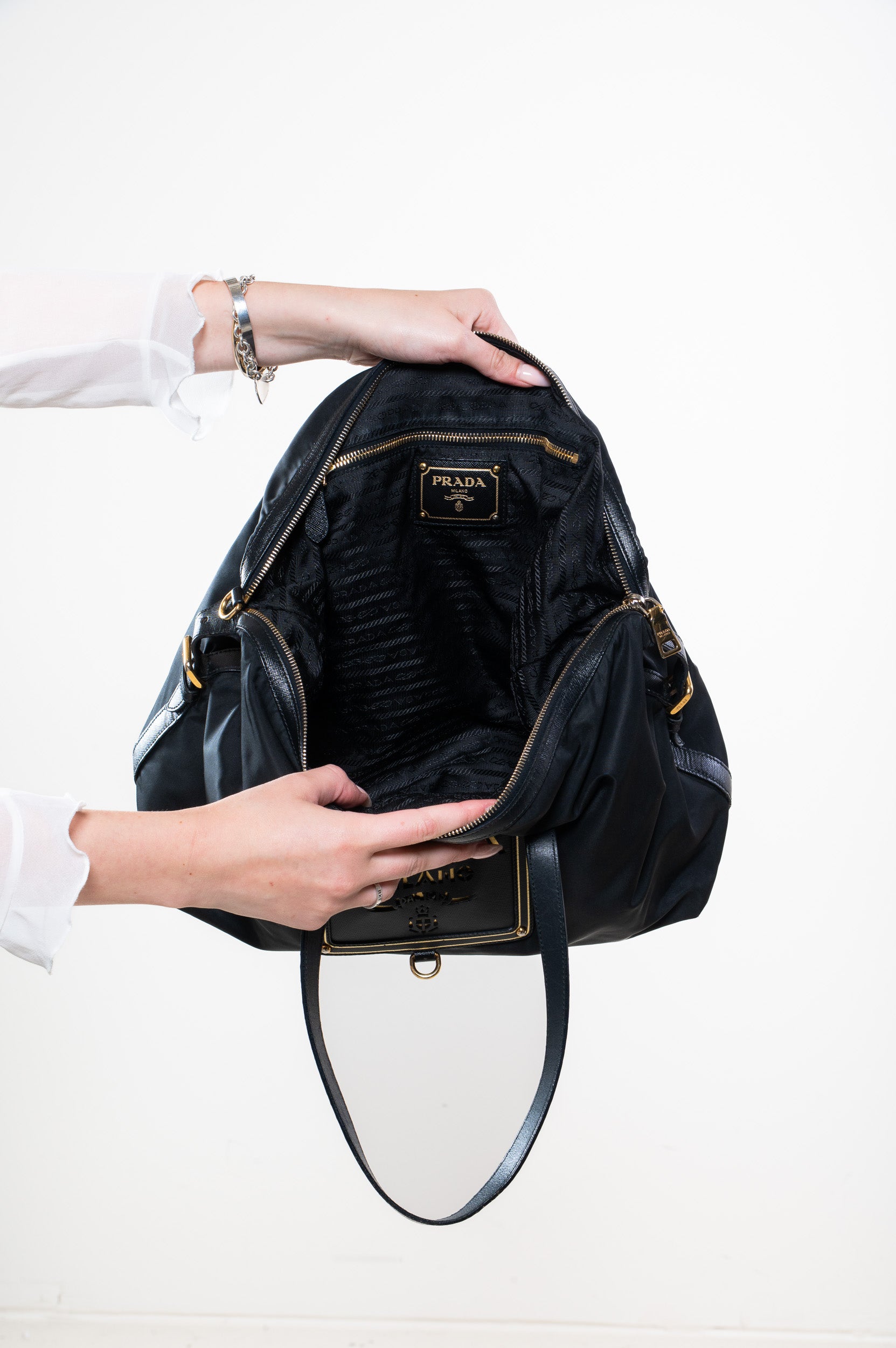 Interior view of Prada Nylon Black Perforated Logo Bag