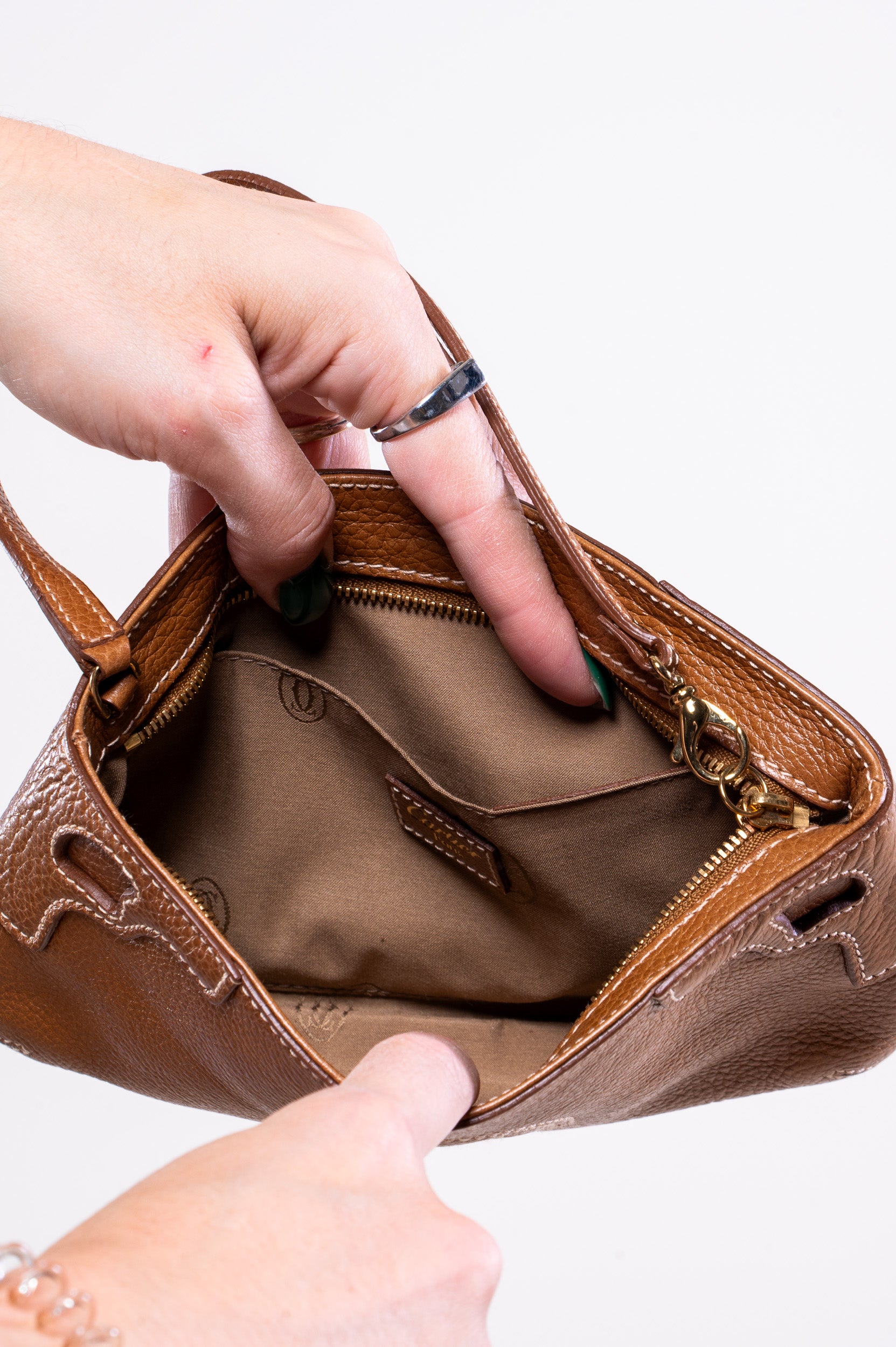 Interior view of Cartier Brown Marcello Zipper Pouch