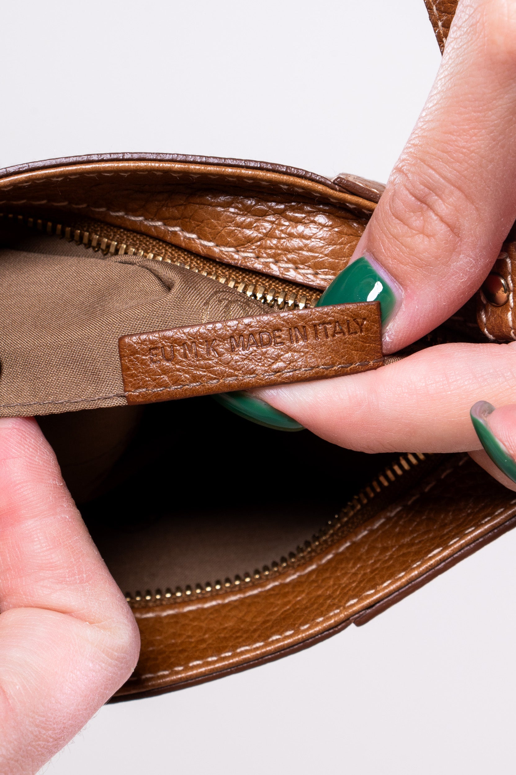 Additional interior view of Cartier Brown Marcello Zipper Pouch