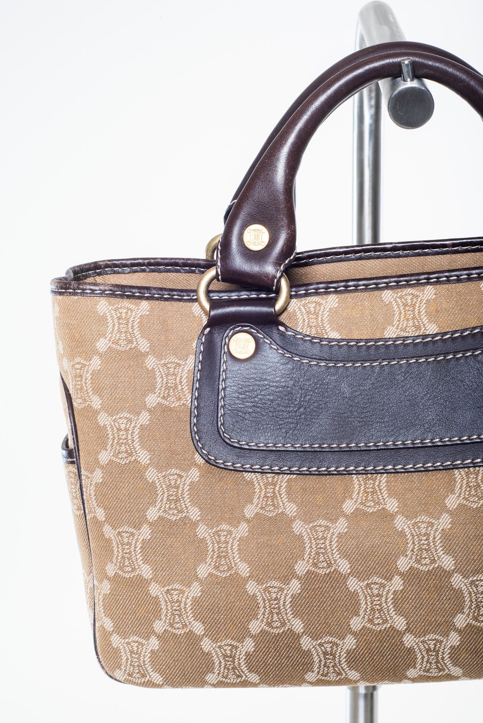 Close-up view of Celine Macadam Fabric Canvas Handbag