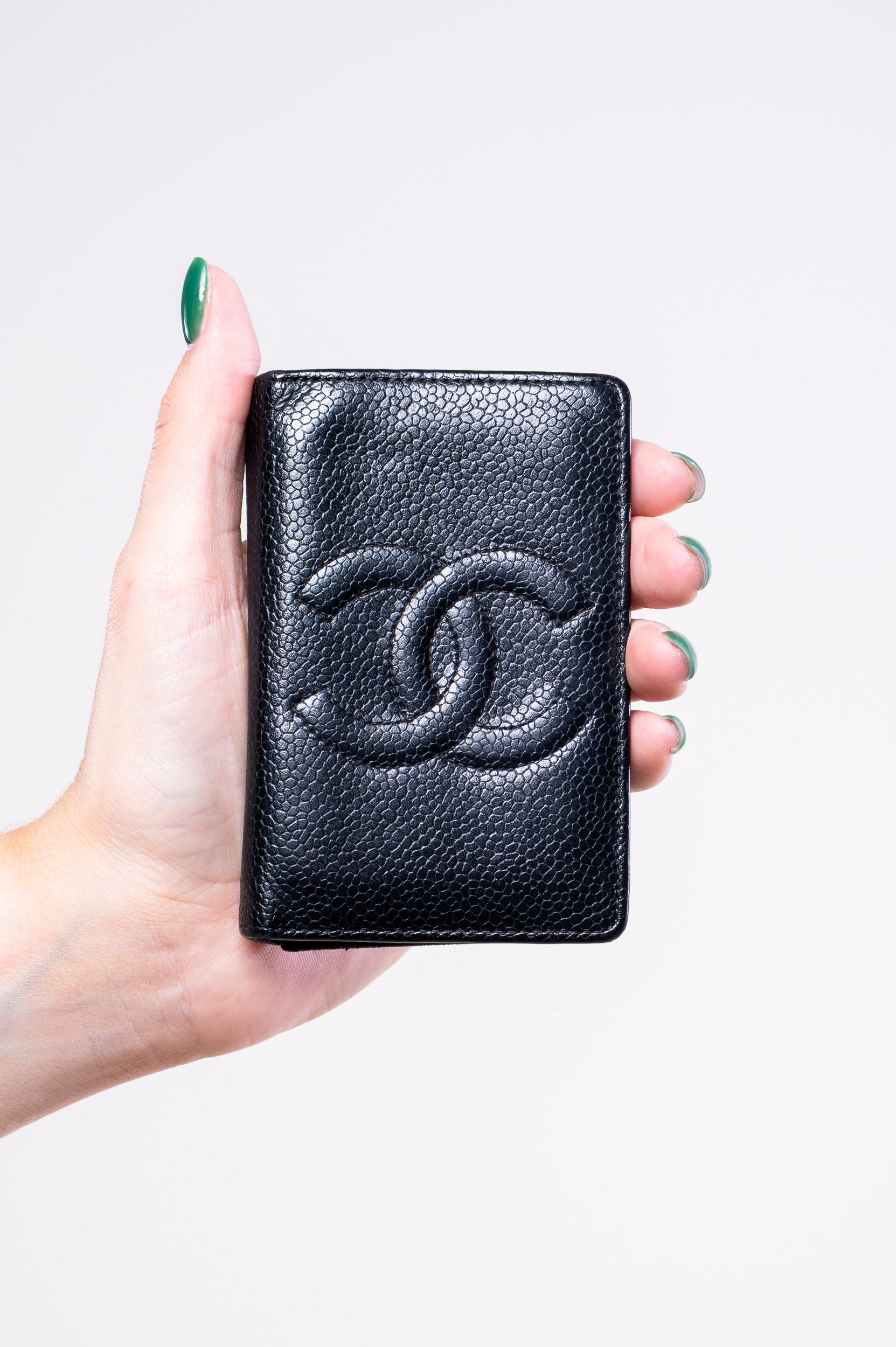 Front view of Chanel CC Caviar Skin Card Case in black leather
