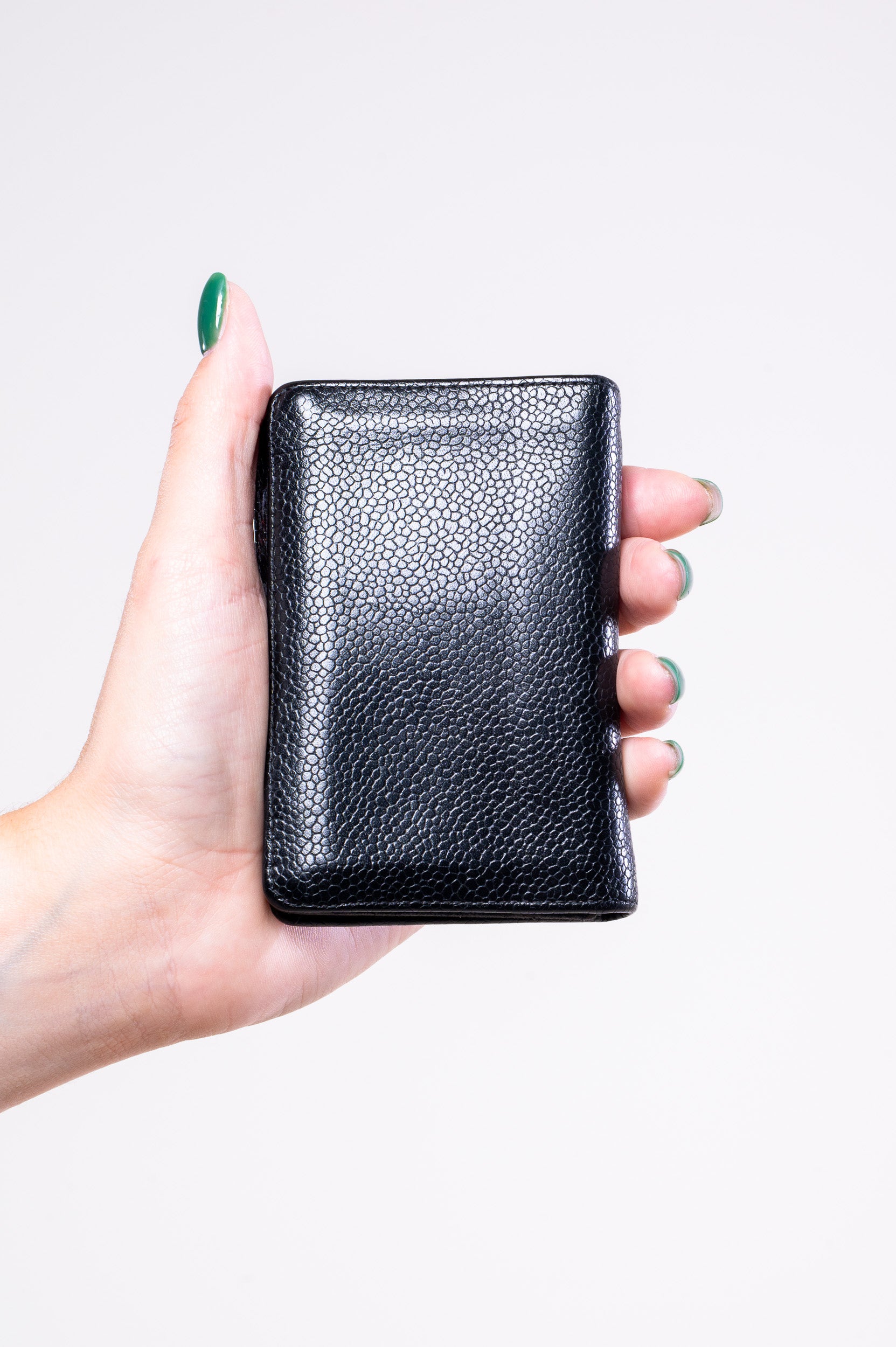 Back view of Chanel CC Caviar Skin Card Case in black leather