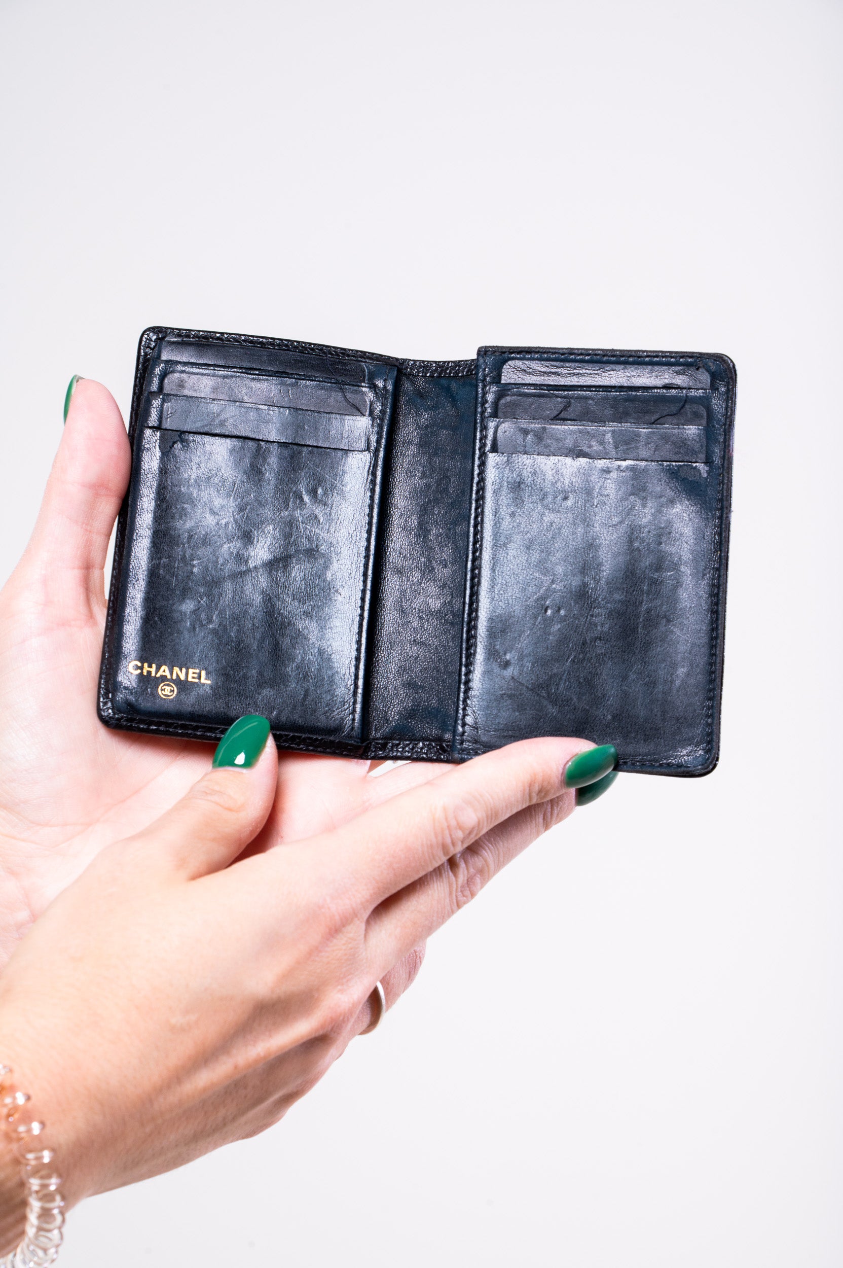 Inside view of Chanel CC Caviar Skin Card Case in black leather