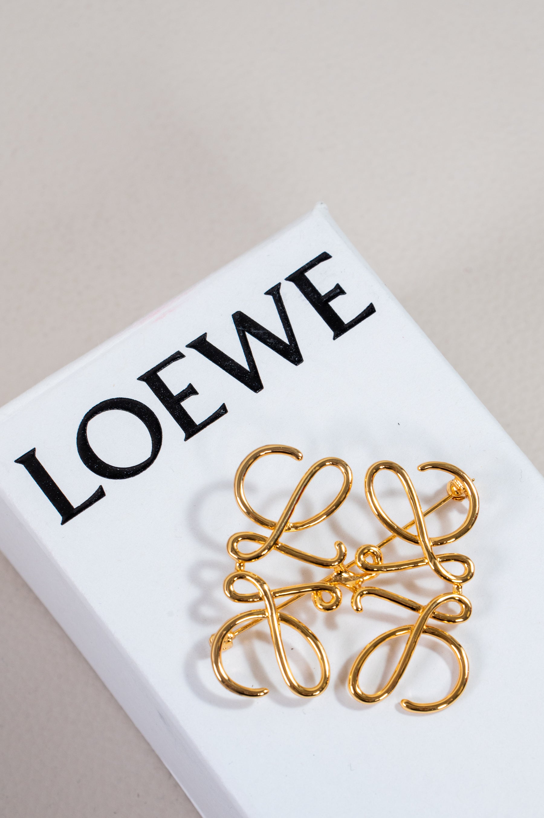 Gold Anagram Metal Brooch