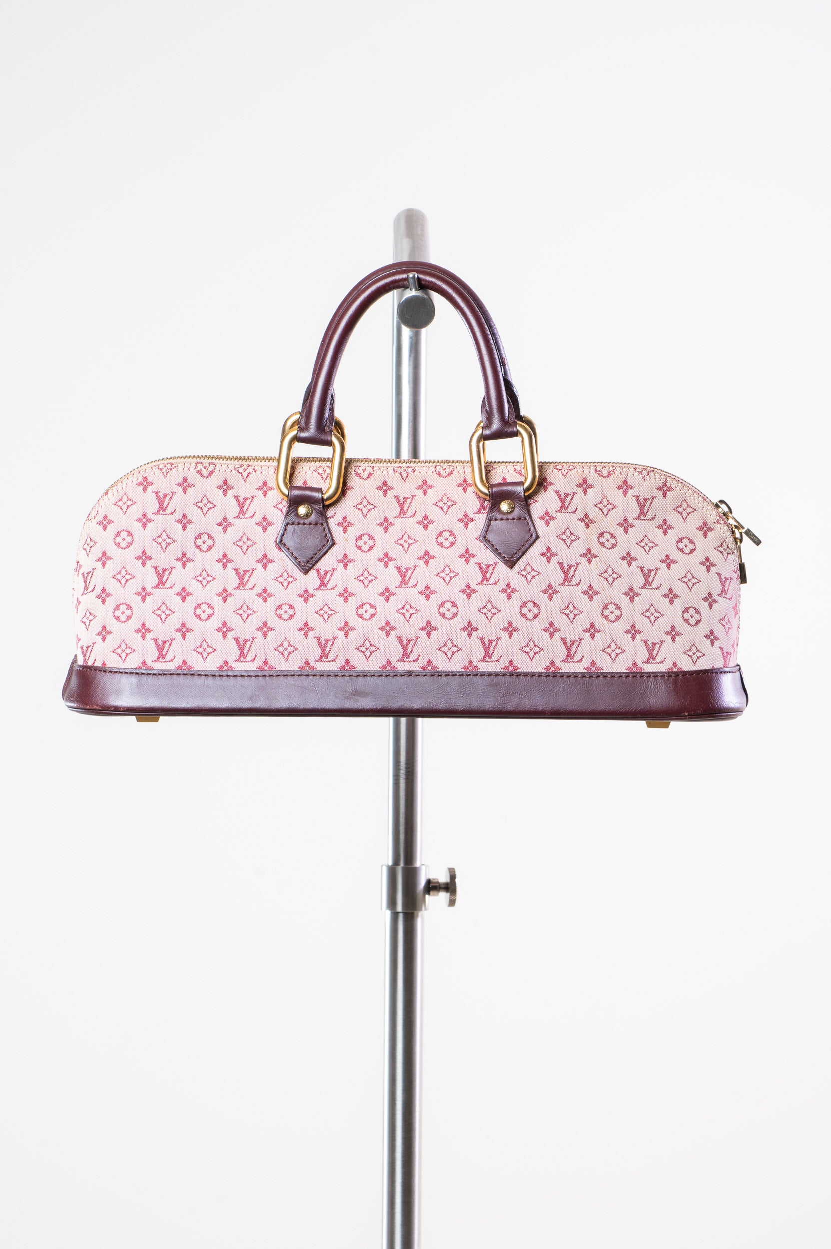 Another side view of Louis Vuitton Vintage Monogram Mini Lin Horizontal Alma Long Bag
