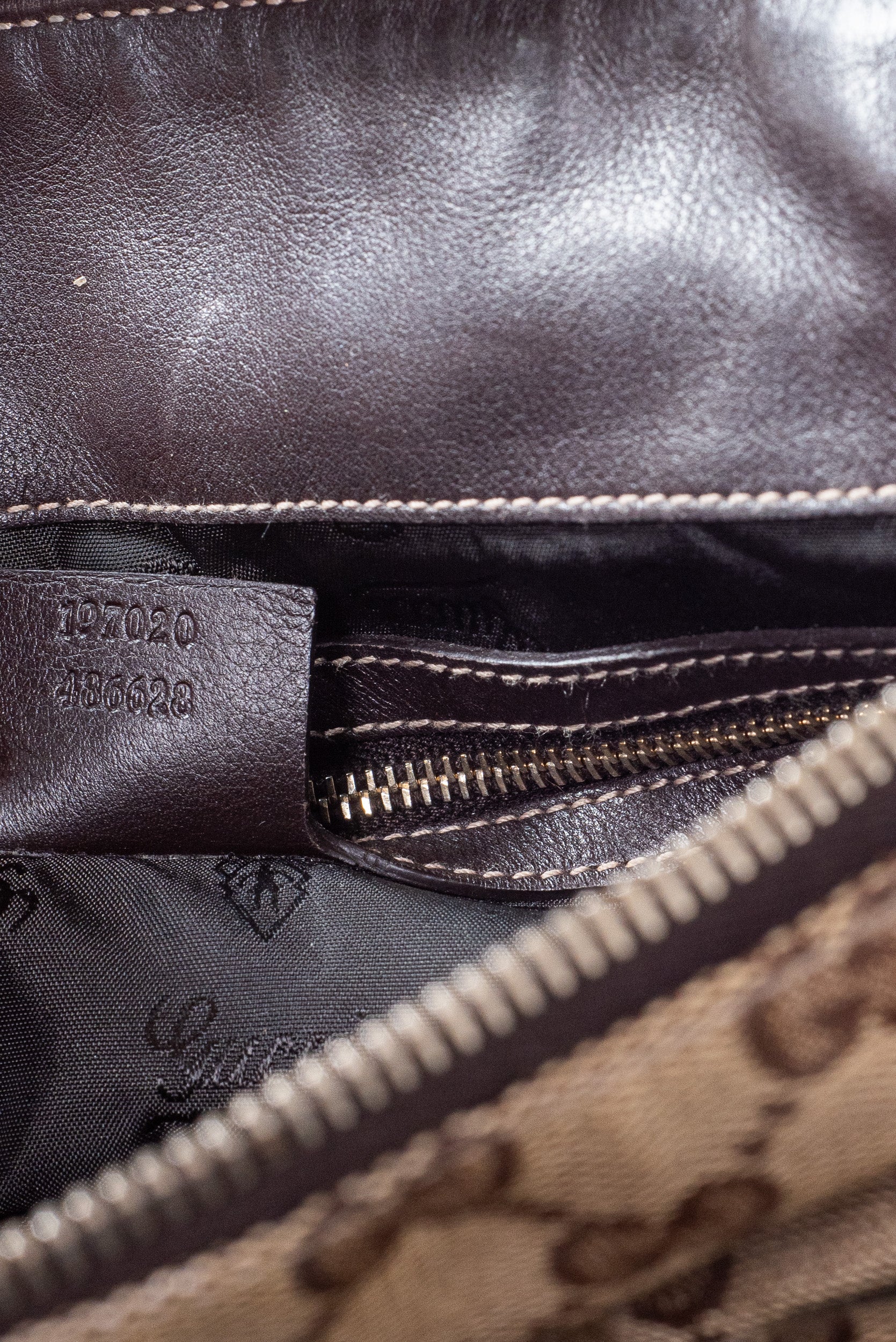 Close-up inside view of Gucci GG Monogram Crystal Hysteria Handbag