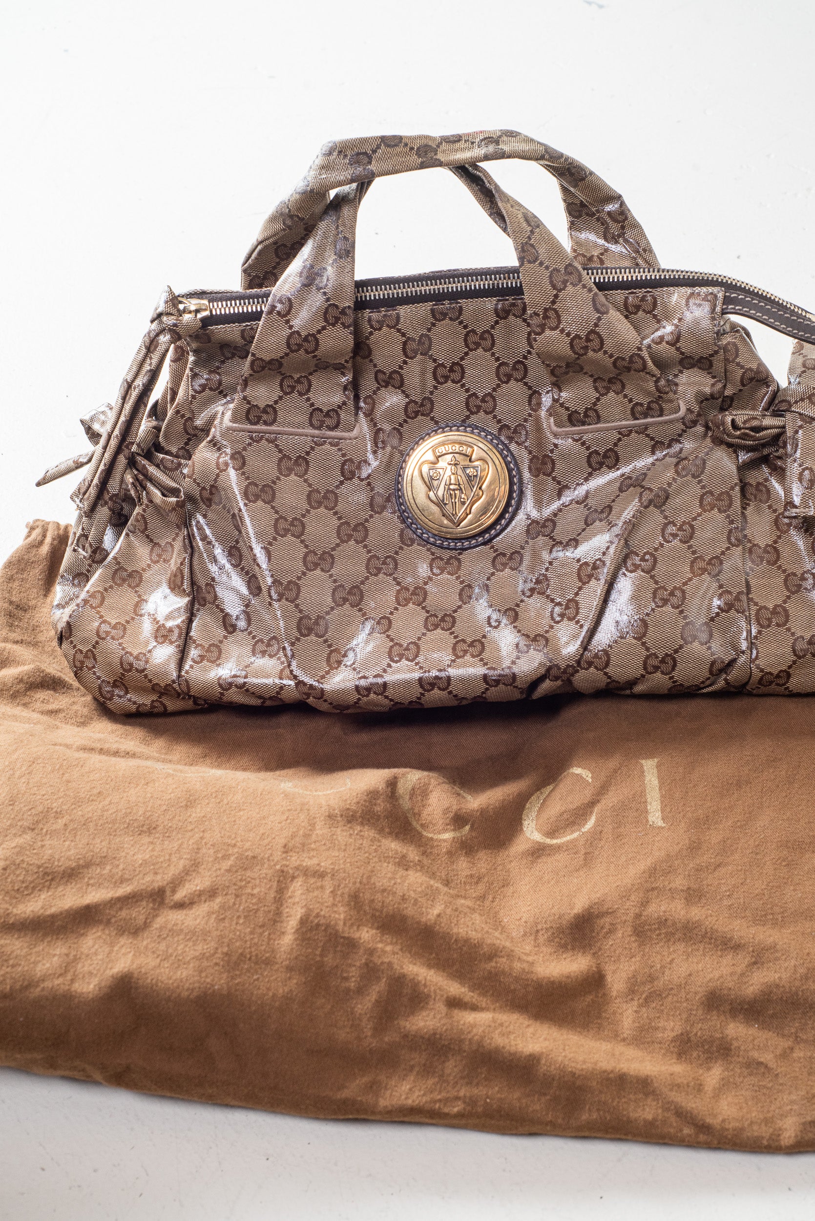 Front view of Gucci GG Monogram Crystal Hysteria Handbag with medallion detail