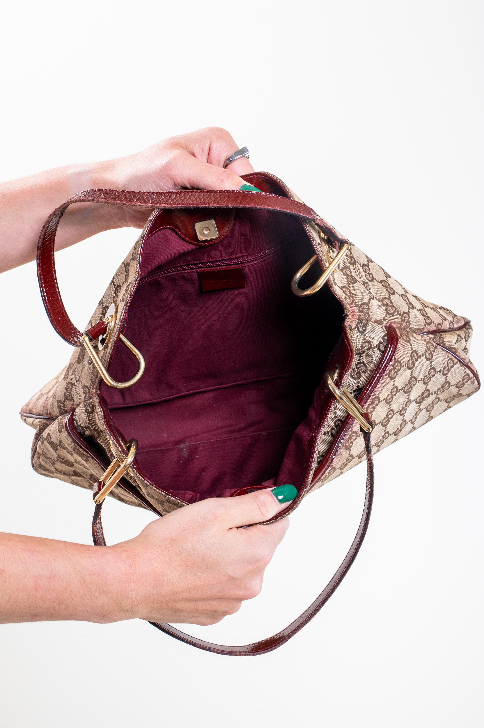 Inside view of Gucci Monogram Canvas Shoulder Bag