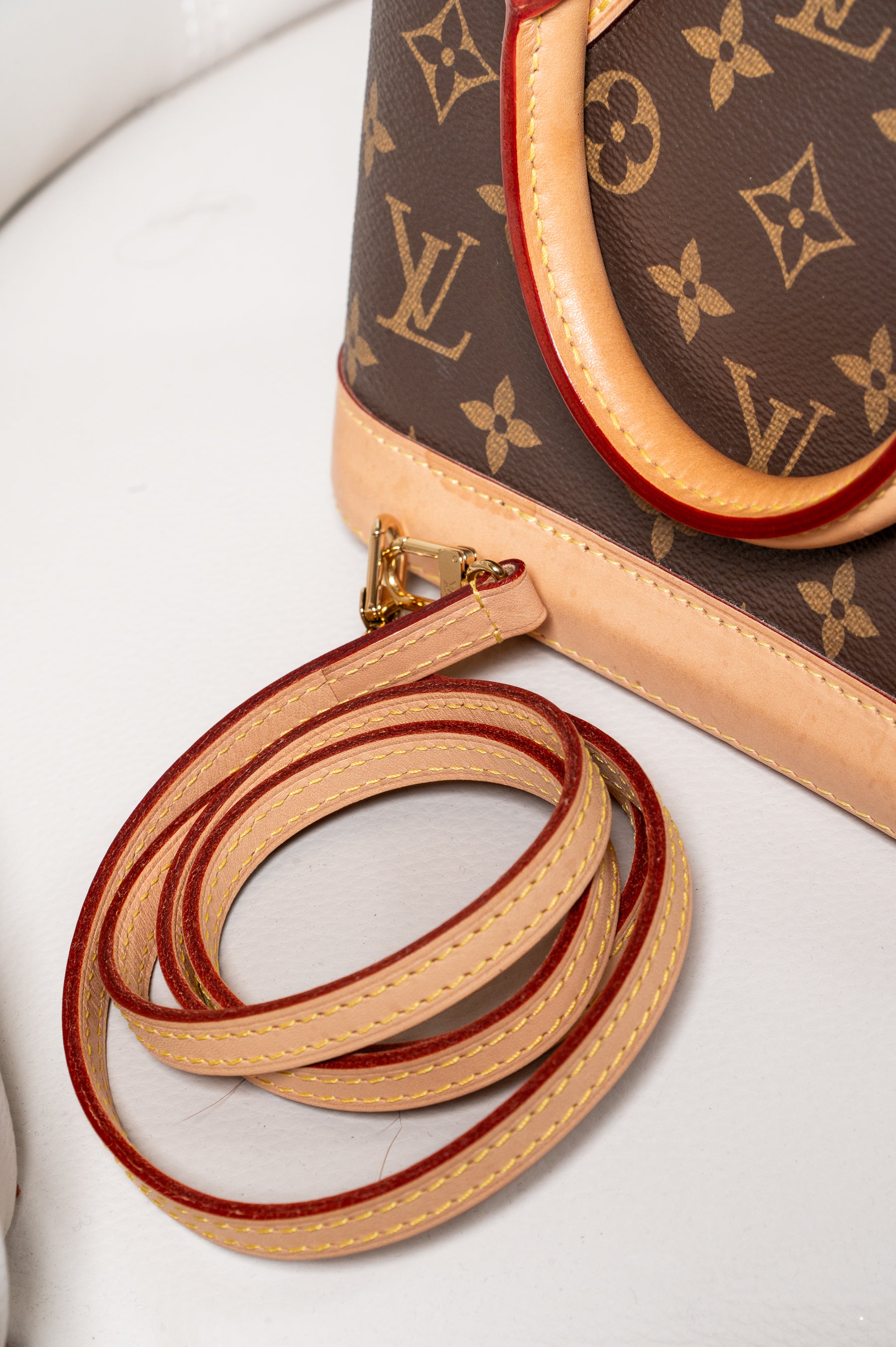 Monogram Alma BB Top Handle Bag