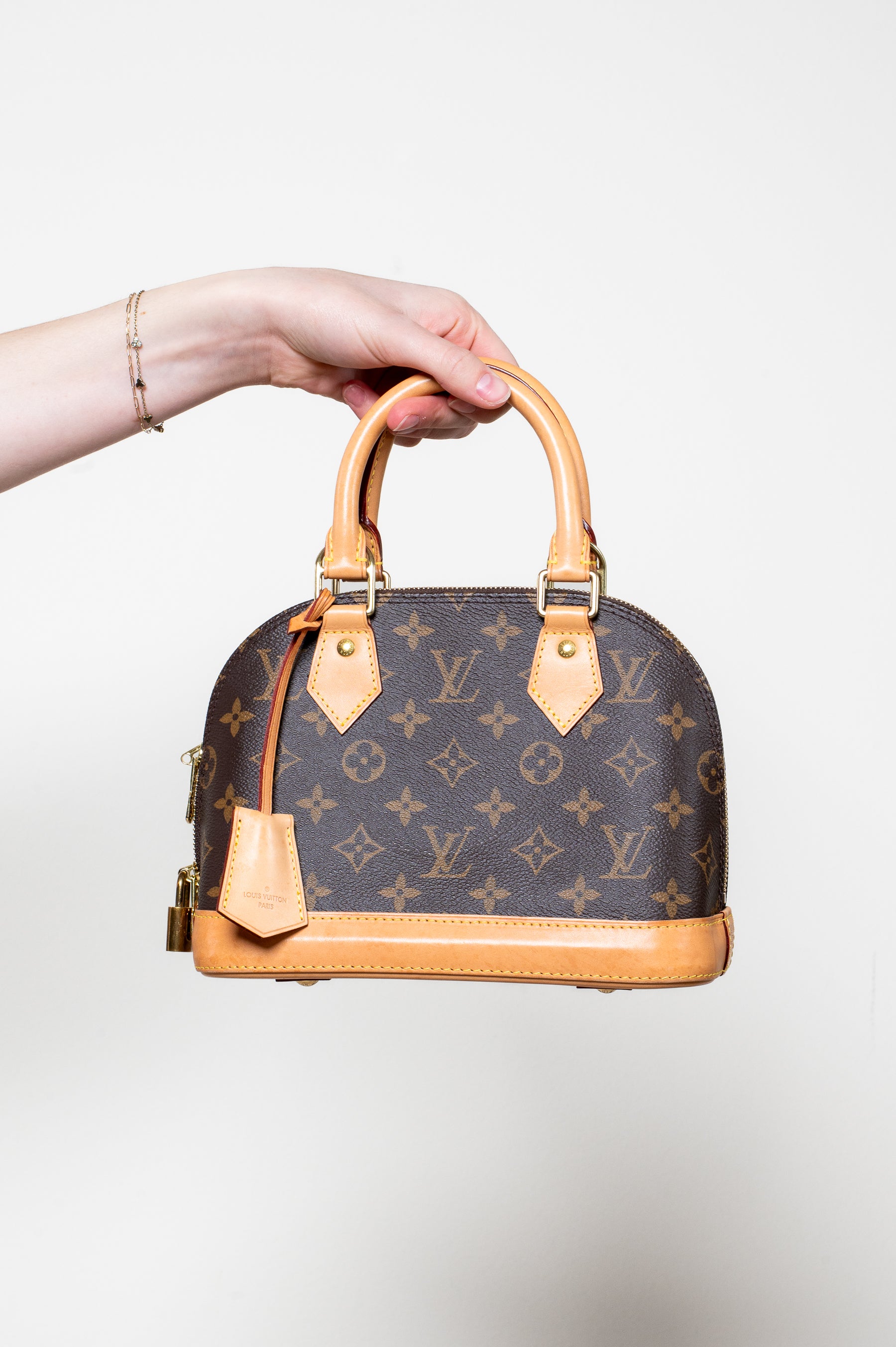 Monogram Alma BB Top Handle Bag