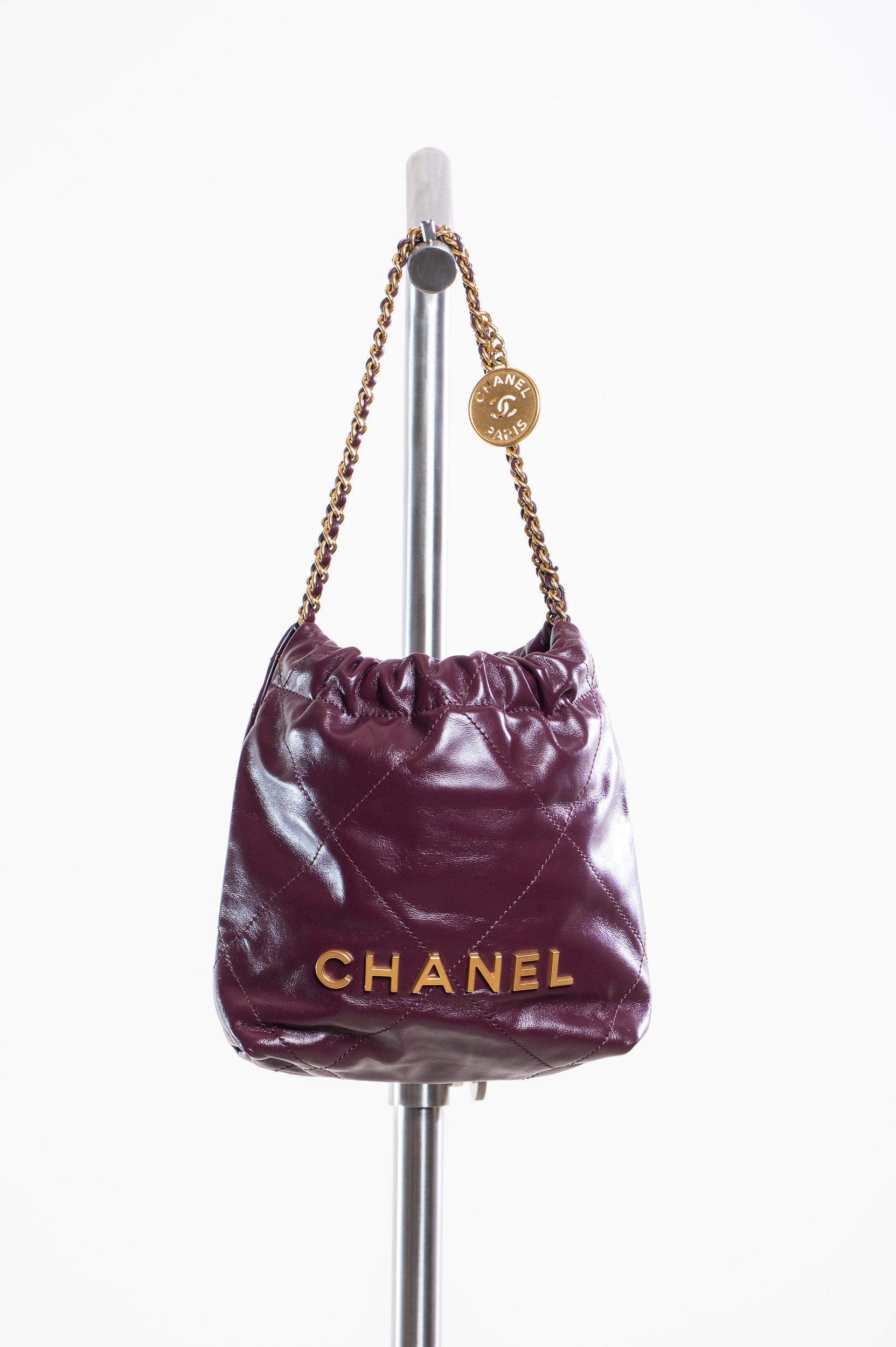 Front view of Chanel Mini Burgundy Calfskin 22 Hobo Bag with gold-tone hardware