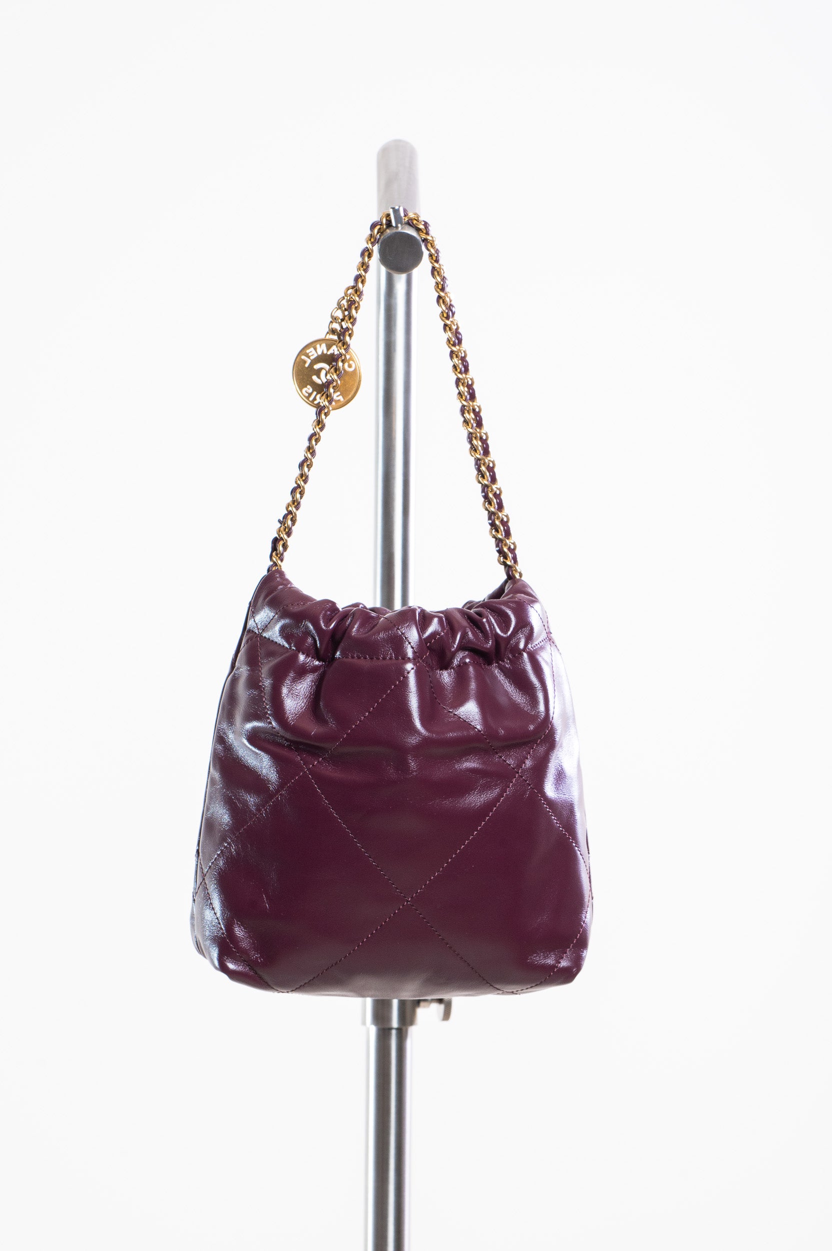 Back view of Chanel Mini Burgundy Calfskin 22 Hobo Bag with gold-tone hardware
