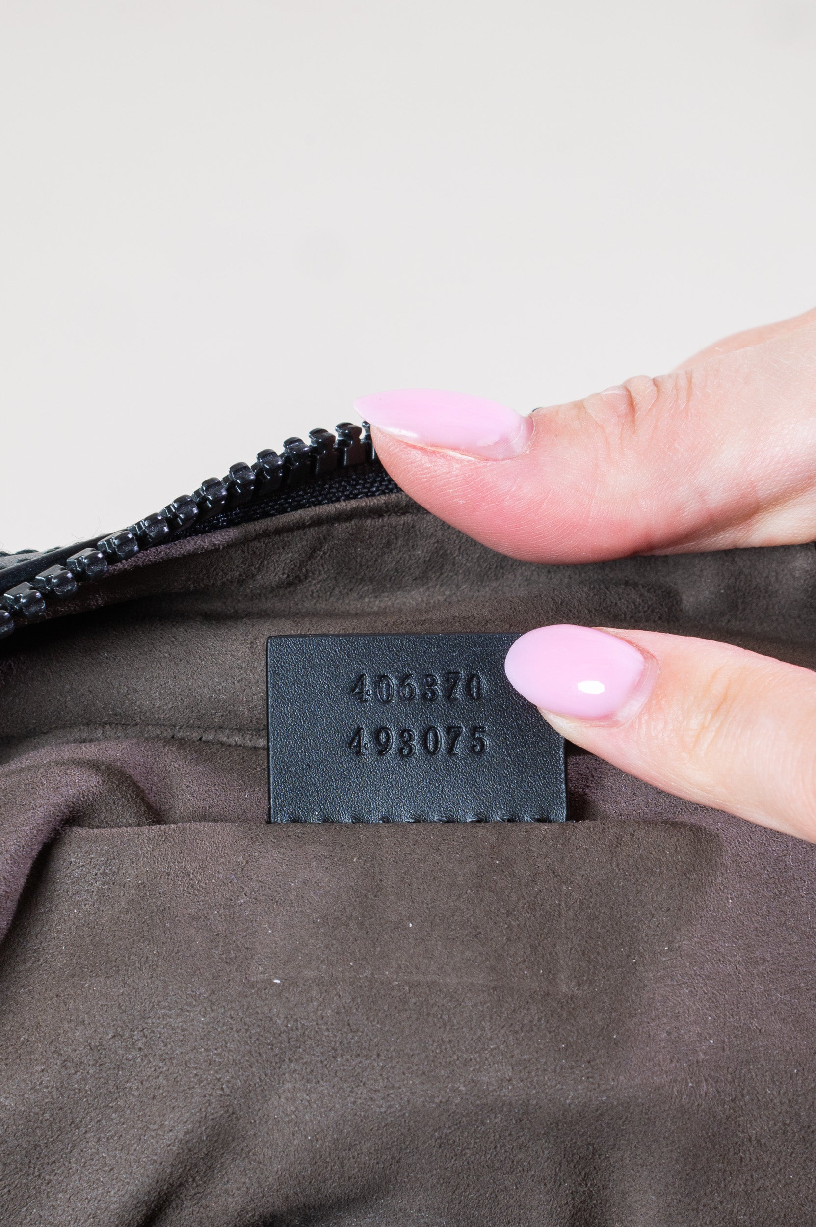 Interior details of Gucci Medium GG Coated Canvas Supreme Eden Backpack