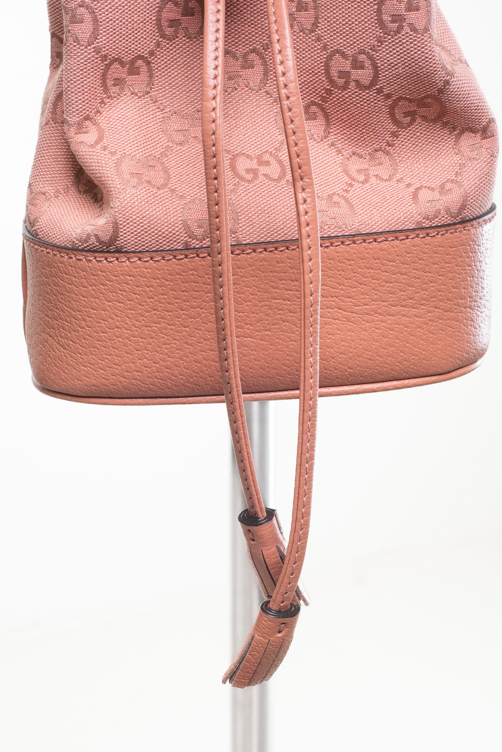Close-up view of Gucci Pink Ophidia Mini GG Crossbody Bag