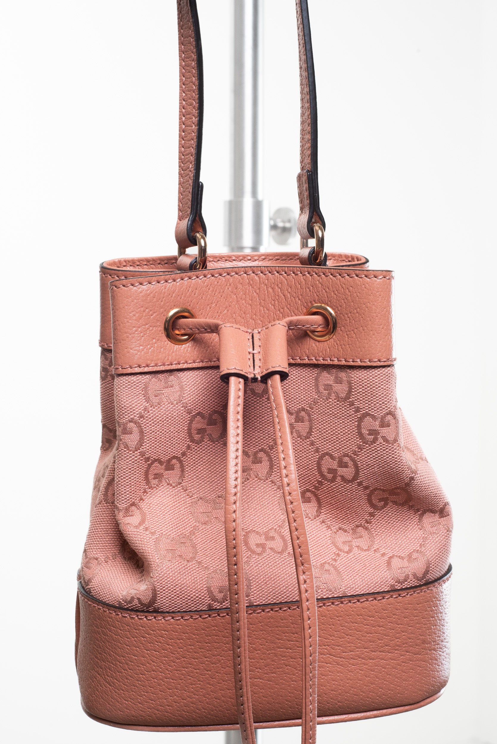 Close-up front view of Gucci Pink Ophidia Mini GG Crossbody Bag