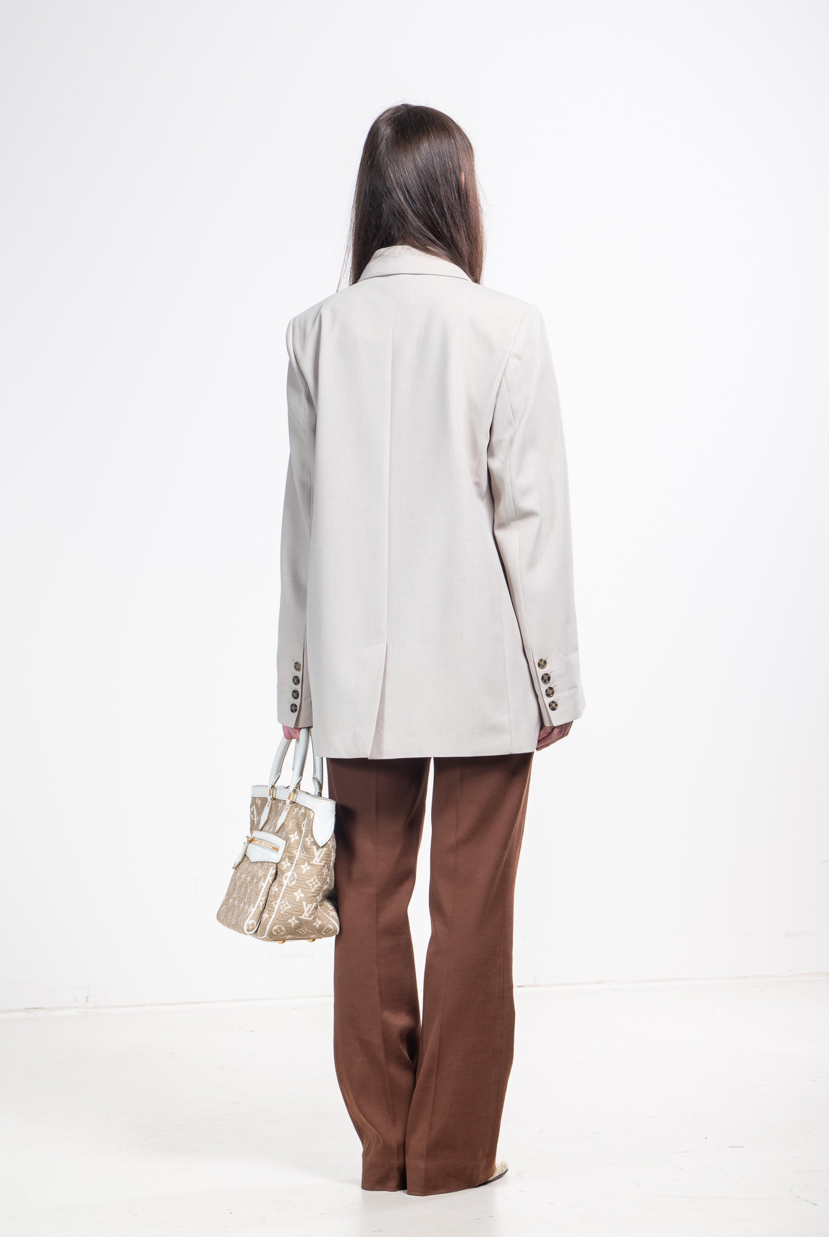 Back view of Herskind Sand Lilith Wrap Blazer