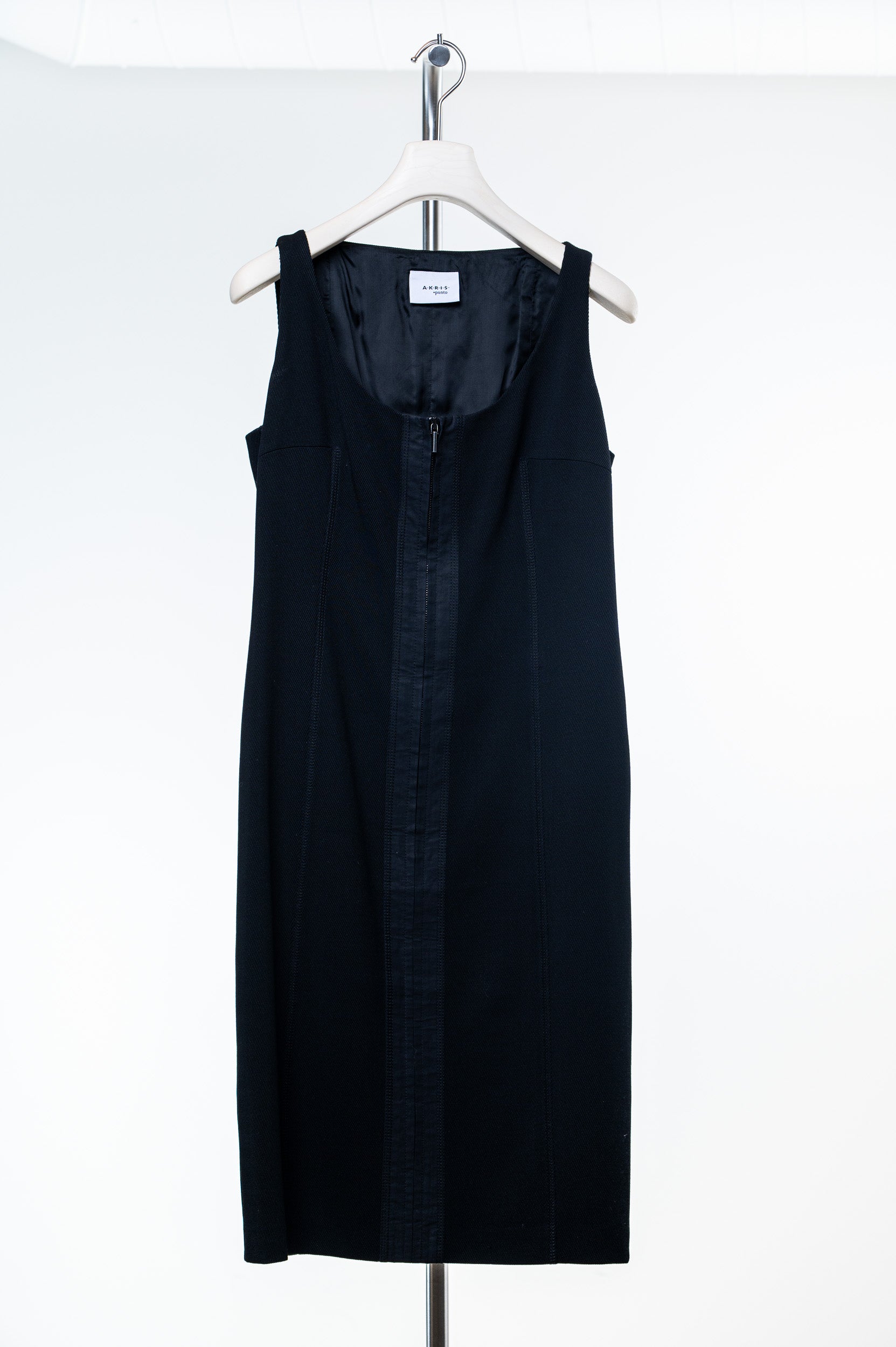 Front view of Akris black wool sleeveless zip-up dress