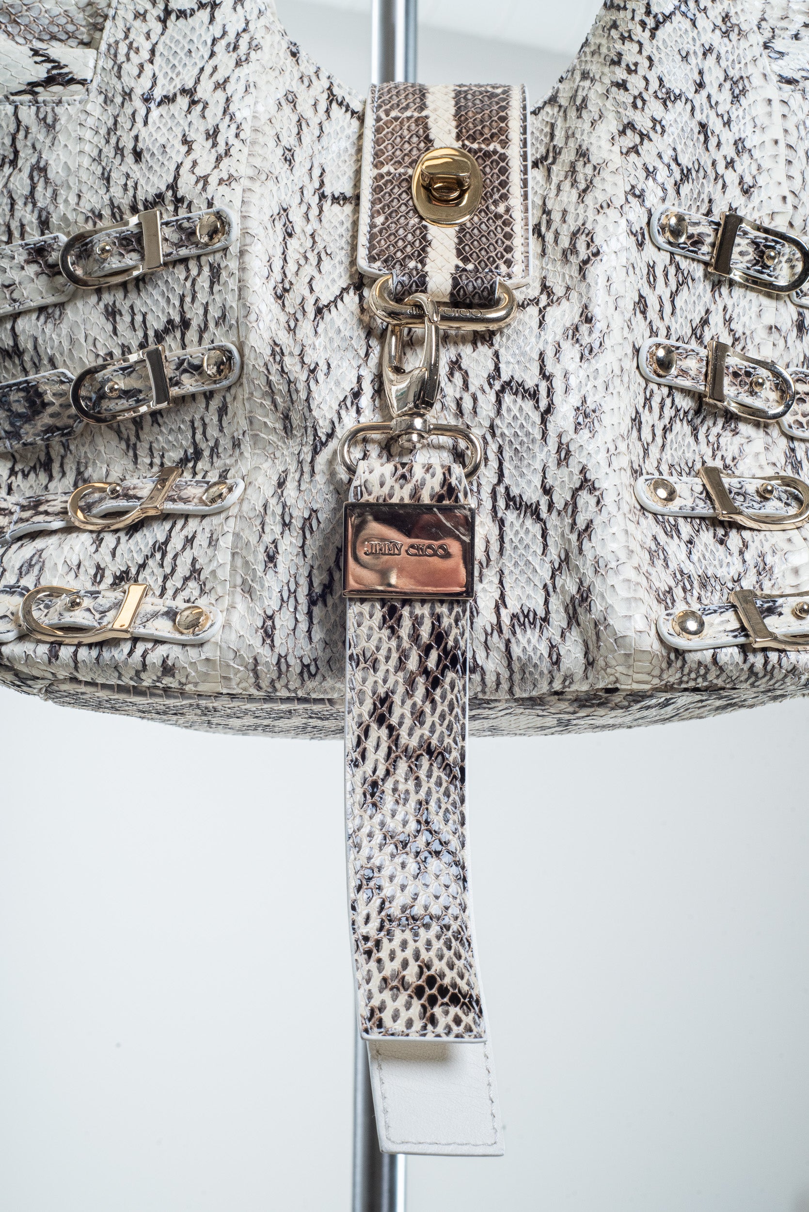 Additional close-up view of Jimmy Choo Bree Snakeskin Tote in white, grey, and black

