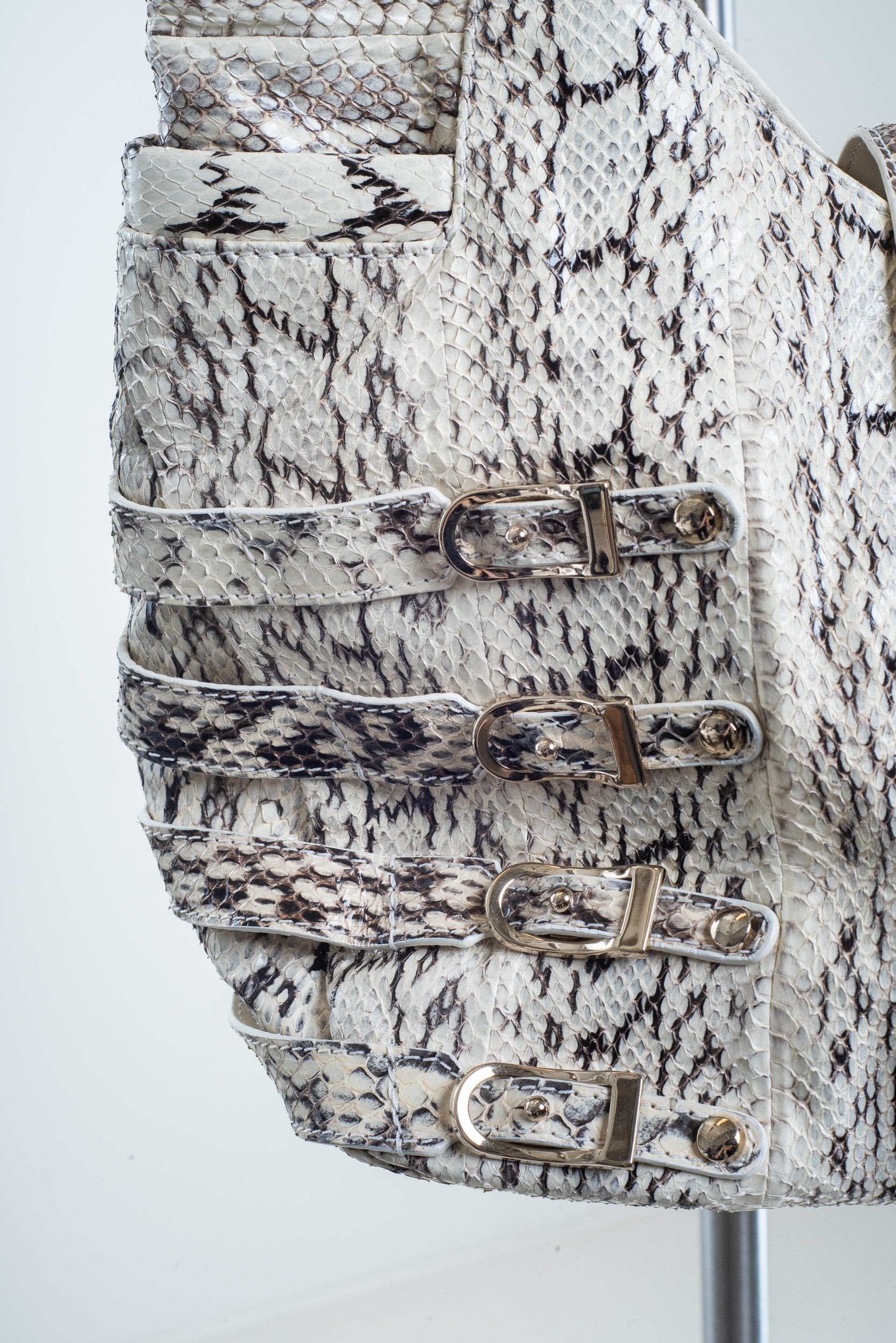 Close-up of crinkled snakeskin leather surface on Jimmy Choo Bree Tote