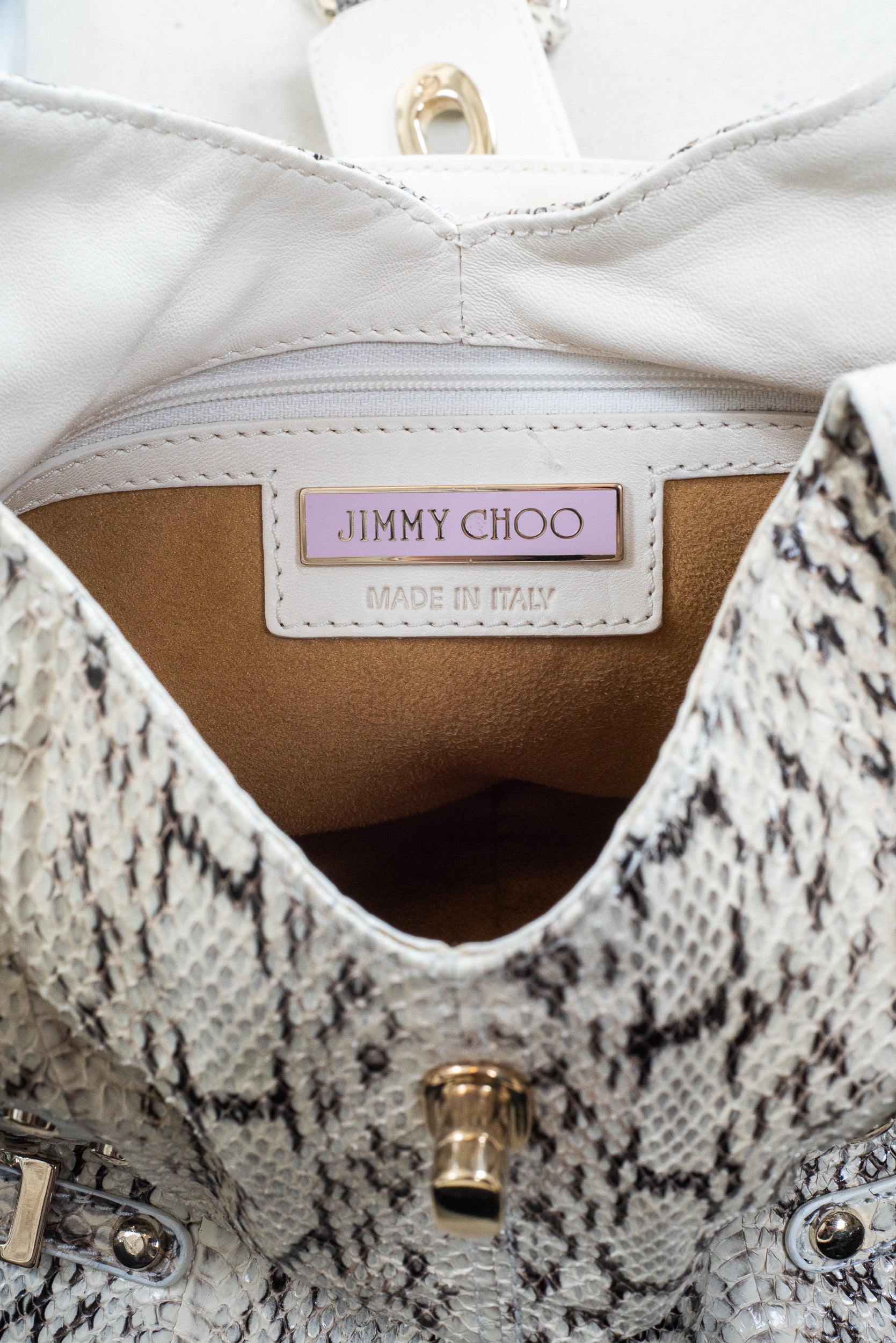 Interior view of Jimmy Choo Bree Tote showing main compartment and pockets