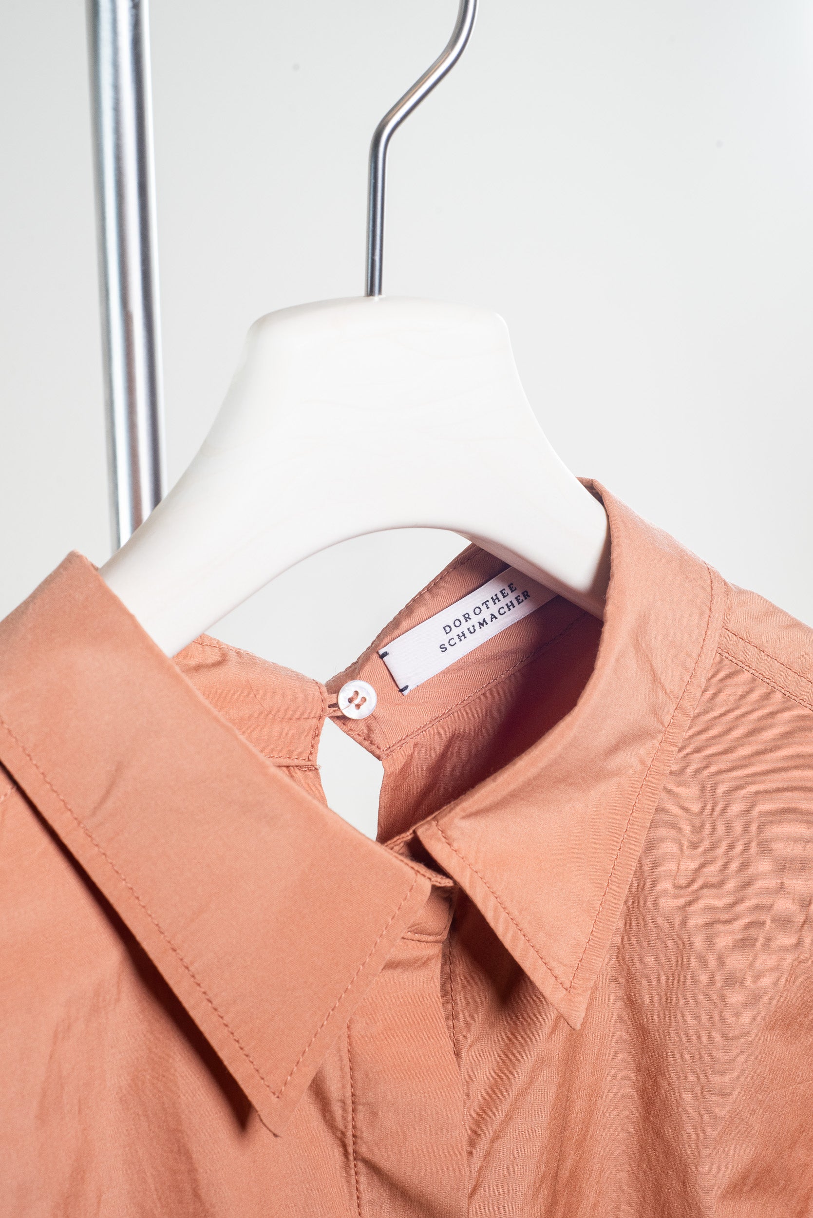 Close-up of Dorothee Schumacher Terracotta Oversized Button-Down Shirt