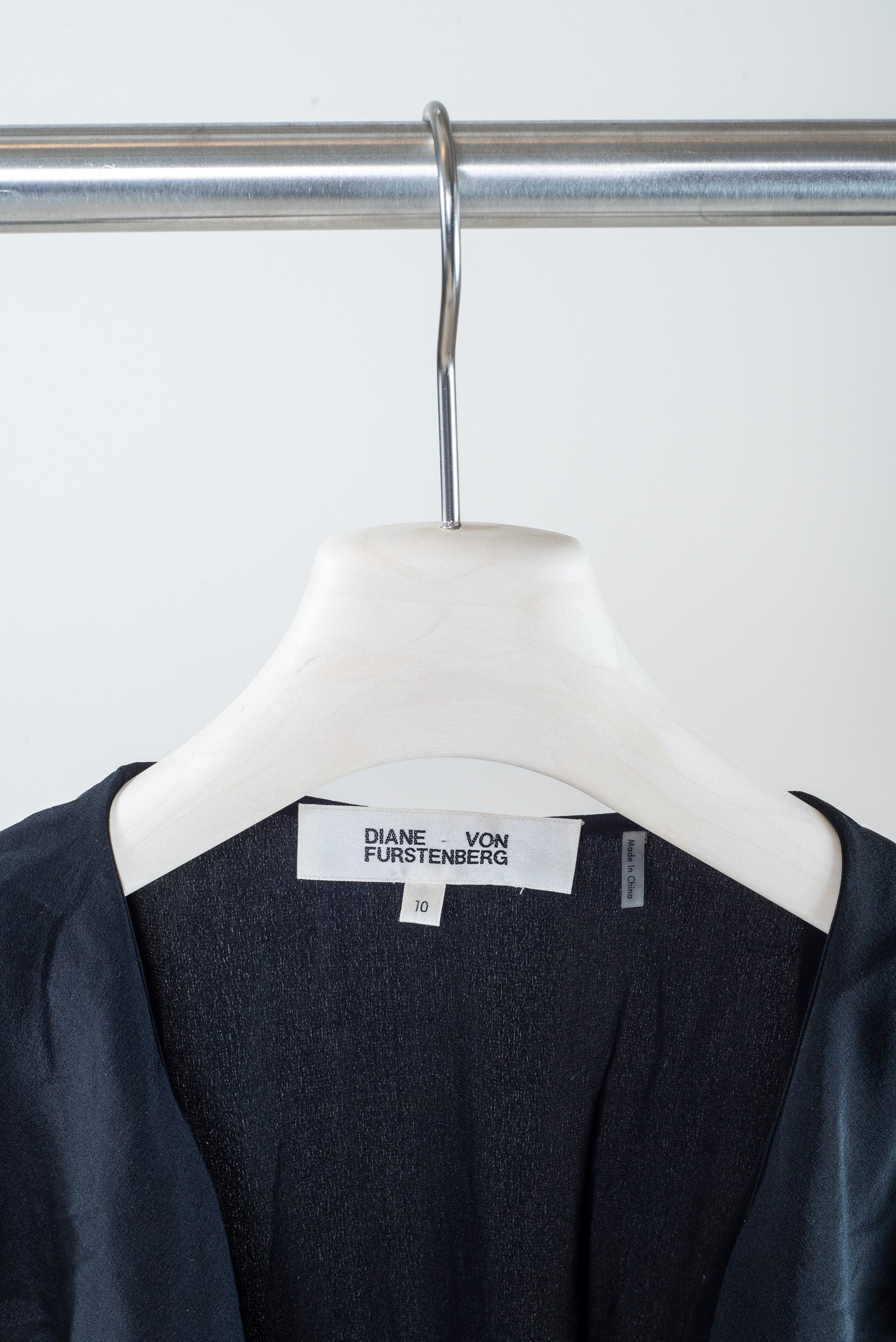 Close-up view of Diane Von Furstenberg Black Ruffled Sleeve Wrap Maxi Dress
