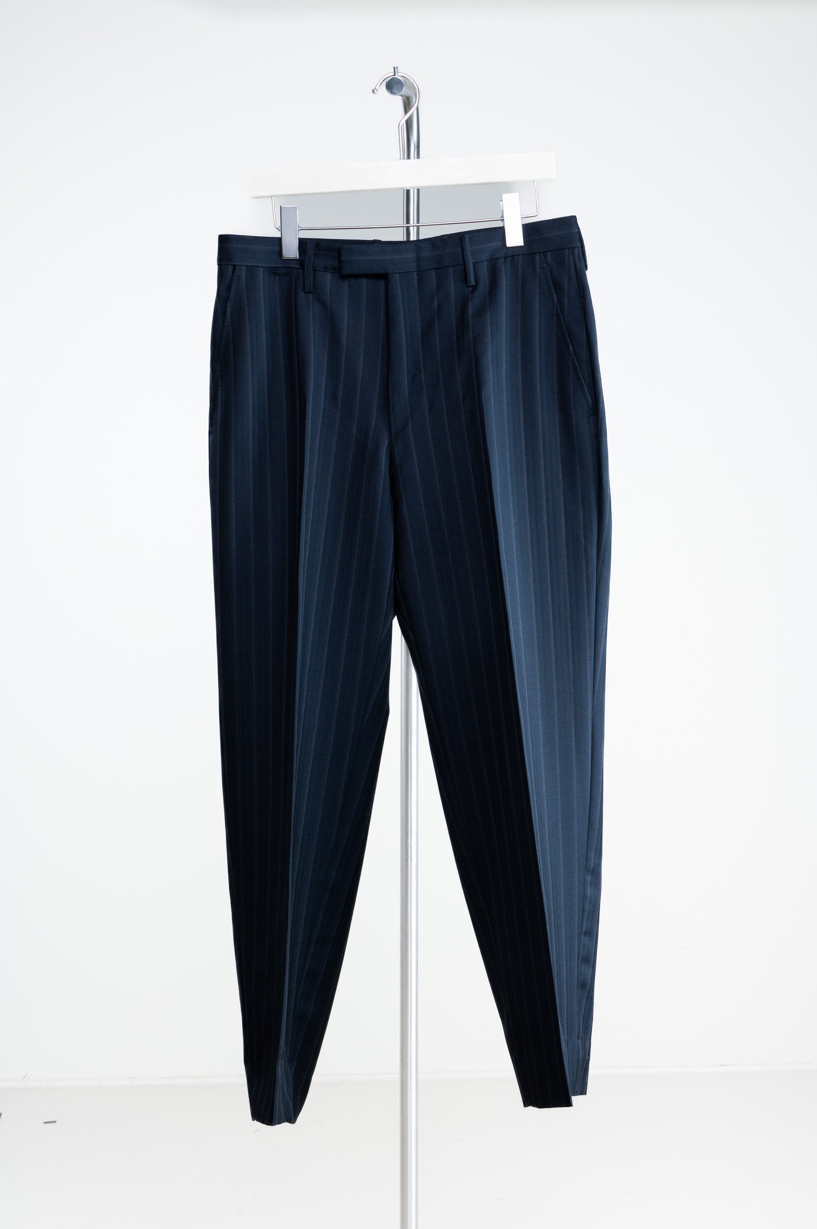 Front view of Gucci Men’s Navy Pinstripe Wool Tailored Pants – size 50R
