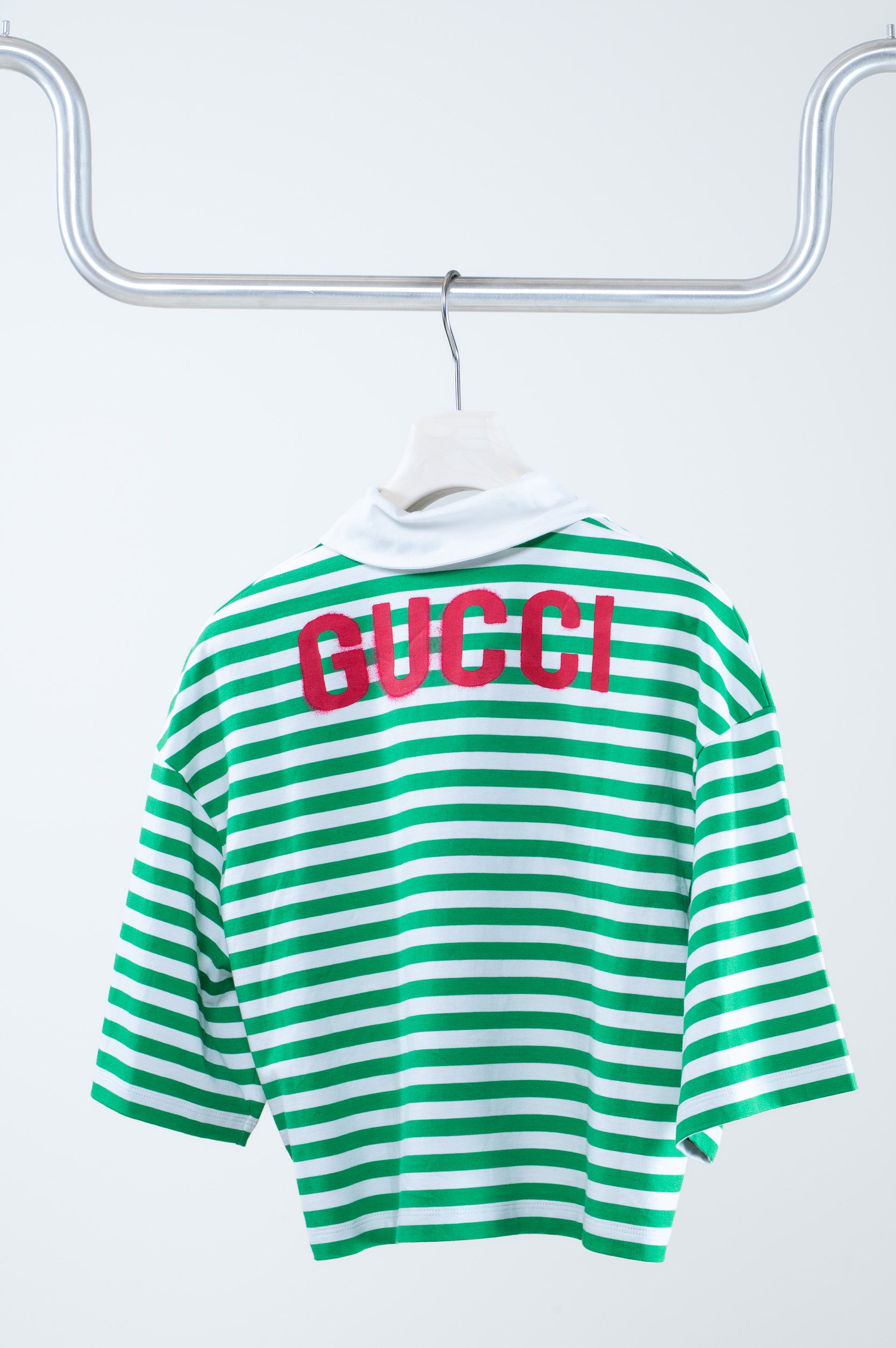 Back view of Gucci Cropped Green and White Striped Polo – size XS, pristine condition