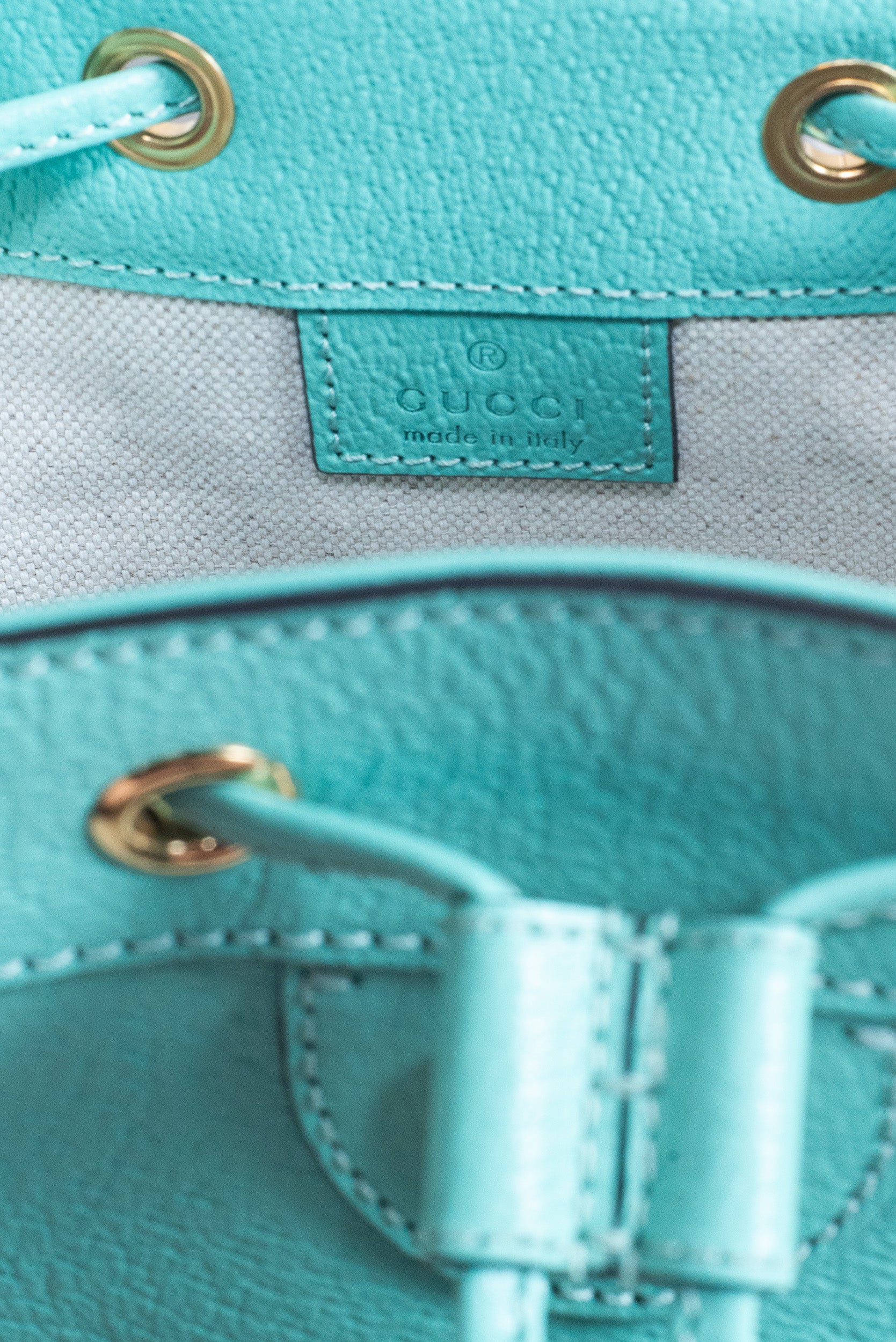 Open top view of Gucci Green Ophidia Drawstring Bucket Bag