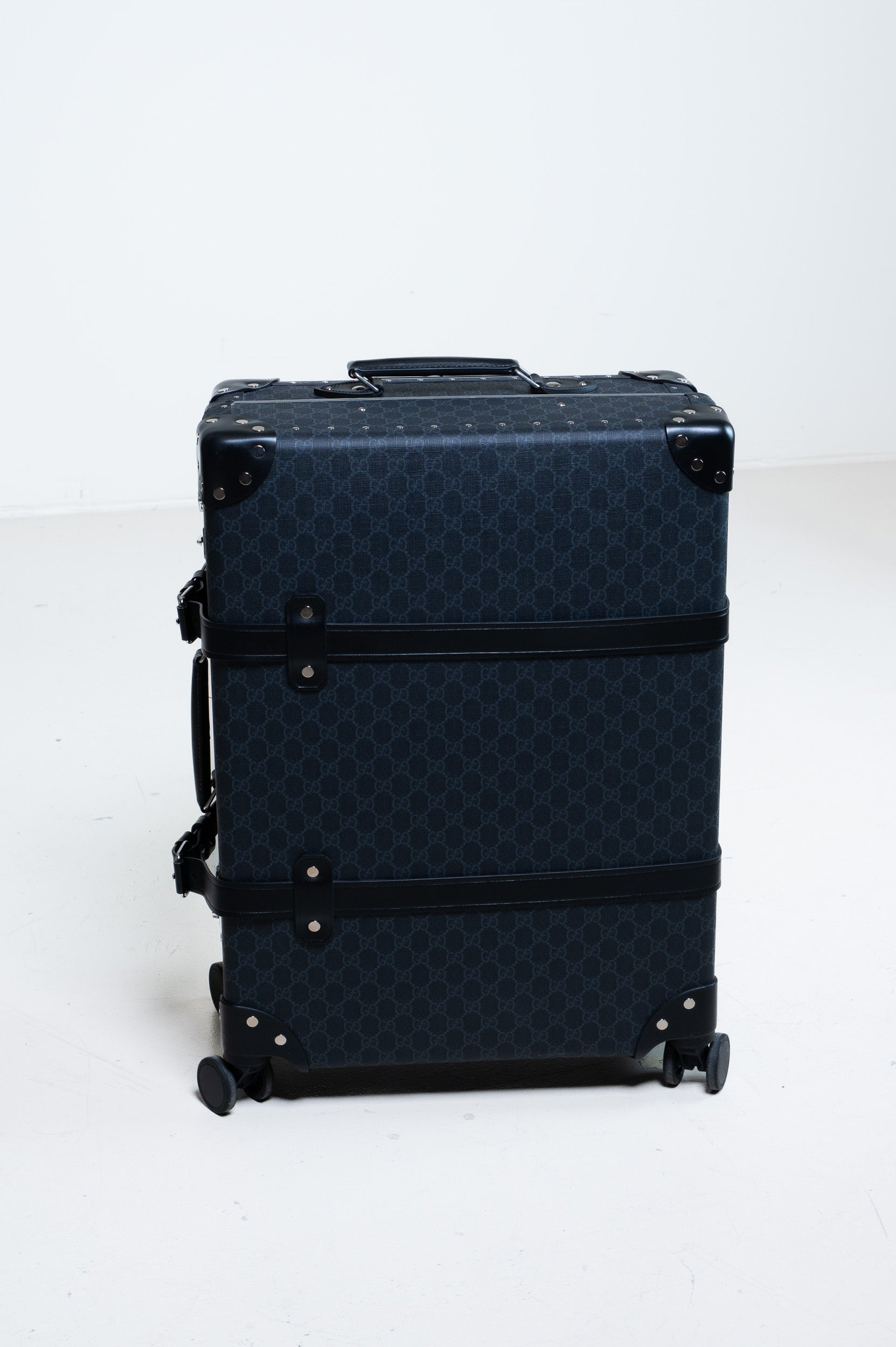 Additional front view of Gucci Globe-Trotter Supreme GG Monogram Luggage in blue/black with top handle