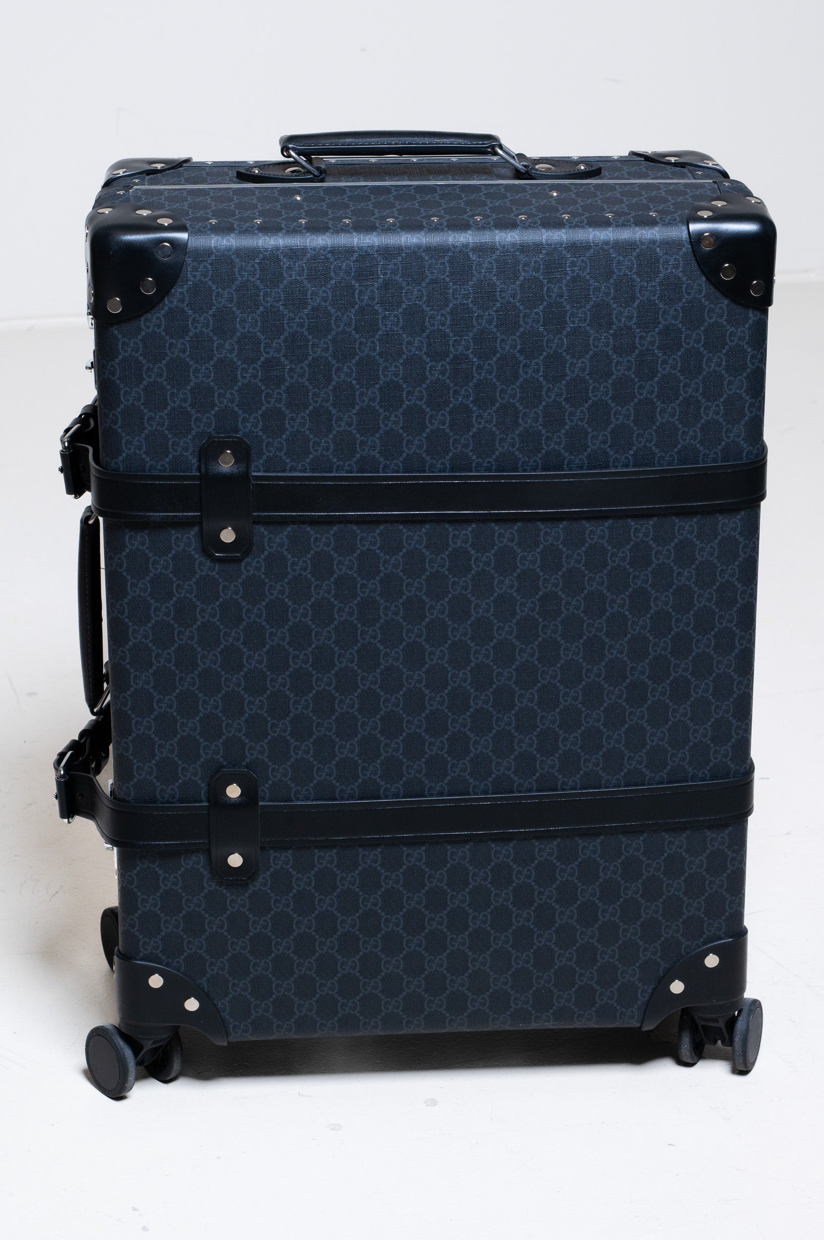 Front view of Gucci Globe-Trotter Supreme GG Monogram Luggage in blue/black with top handle