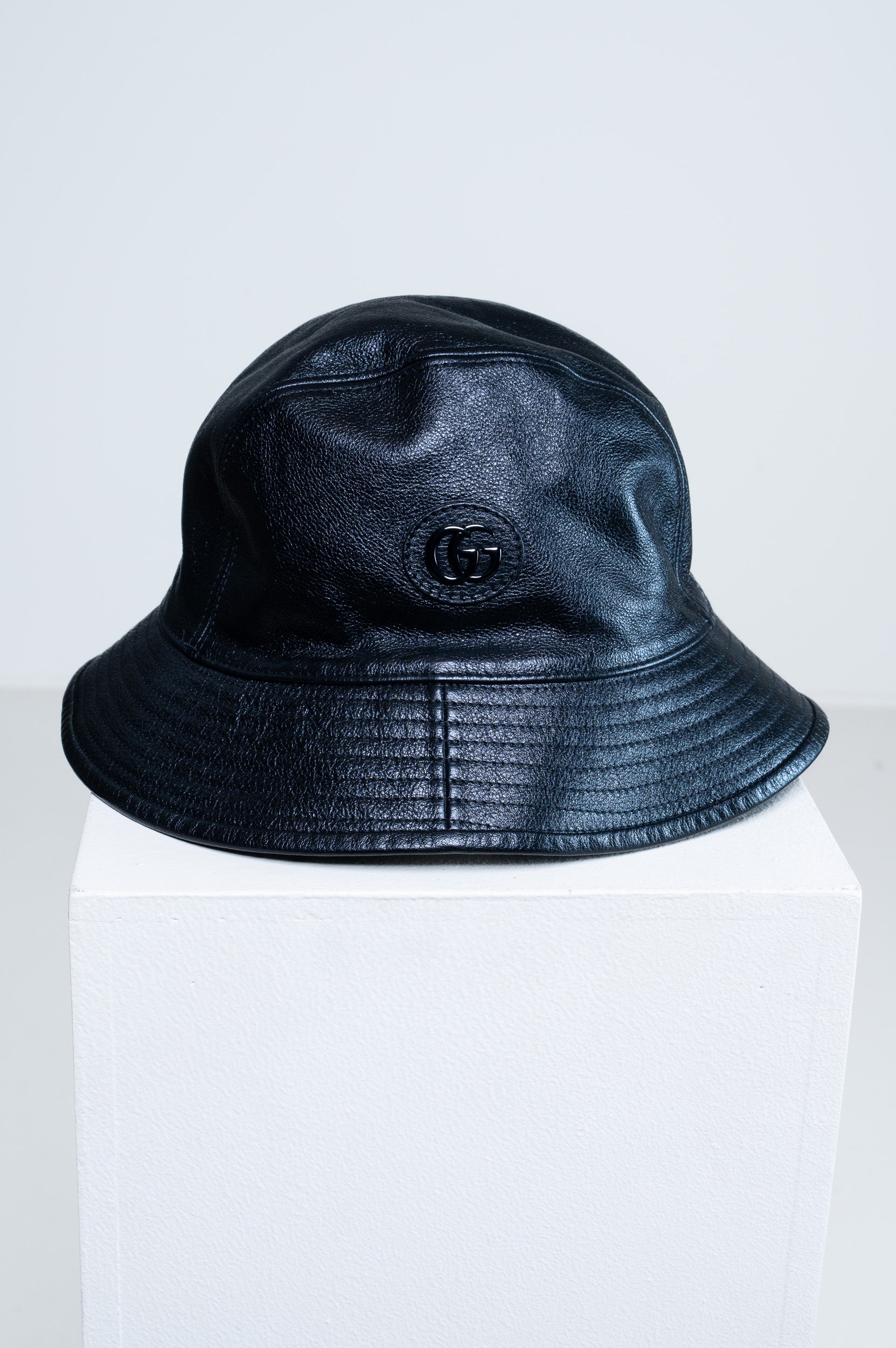 Gucci Black Leather GG Bucket Hat front view with GG canvas detail