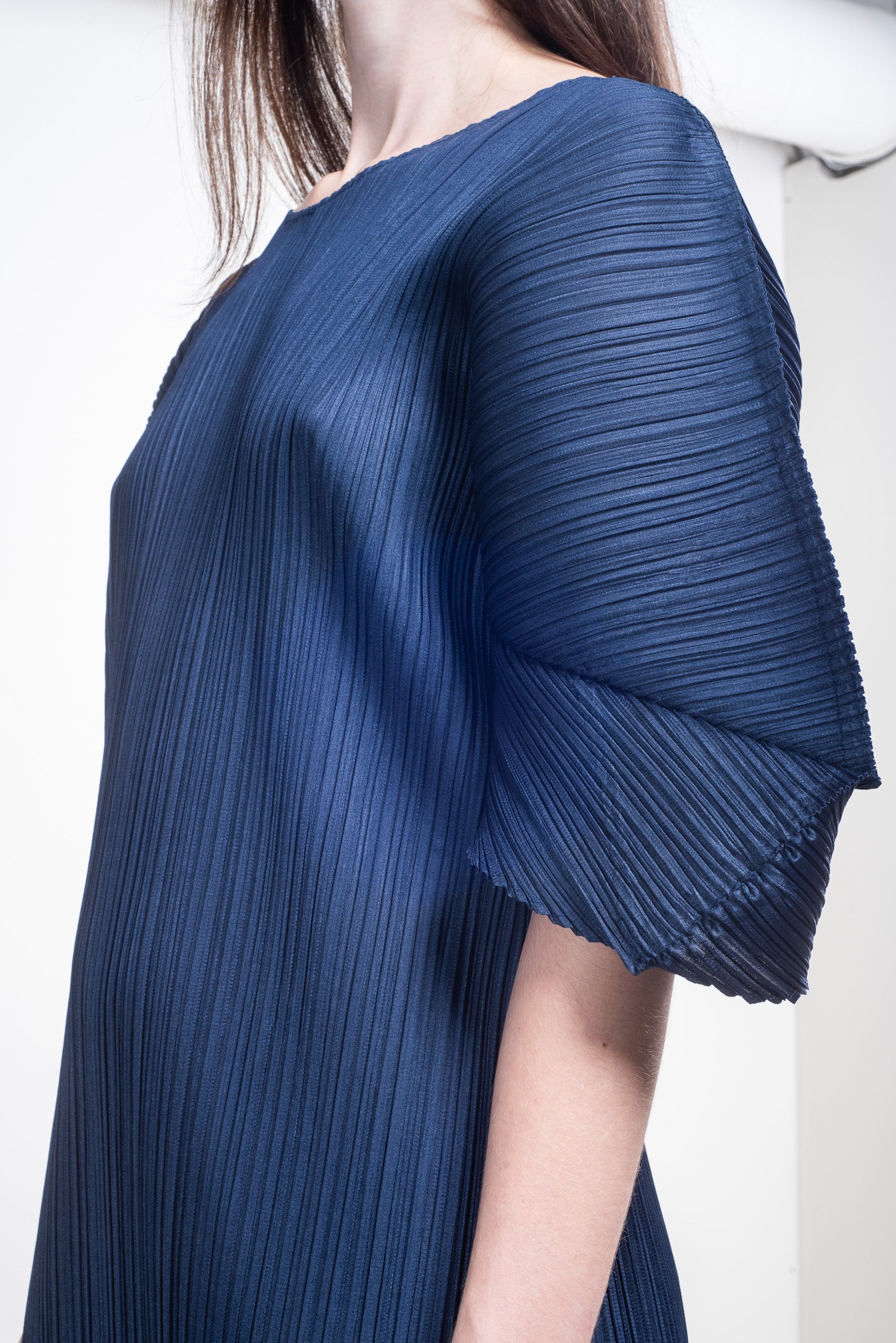 Close-up side view of Issey Miyake Pleats Please Navy T-Shirt Pleated Maxi Dress