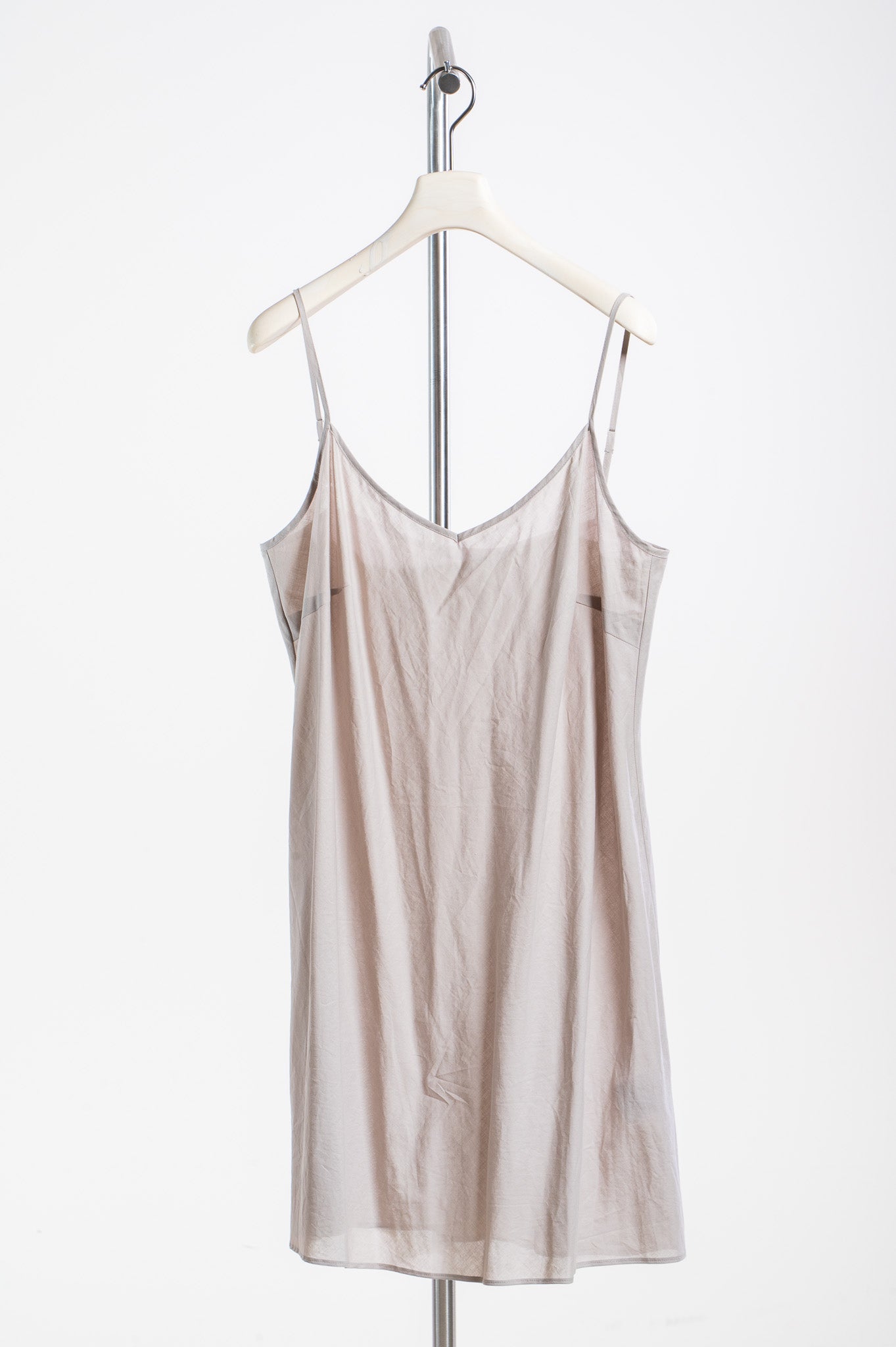 Slip worn underneath Luisa Cerano Taupe Eyelet Long Sleeve Mini Dress
