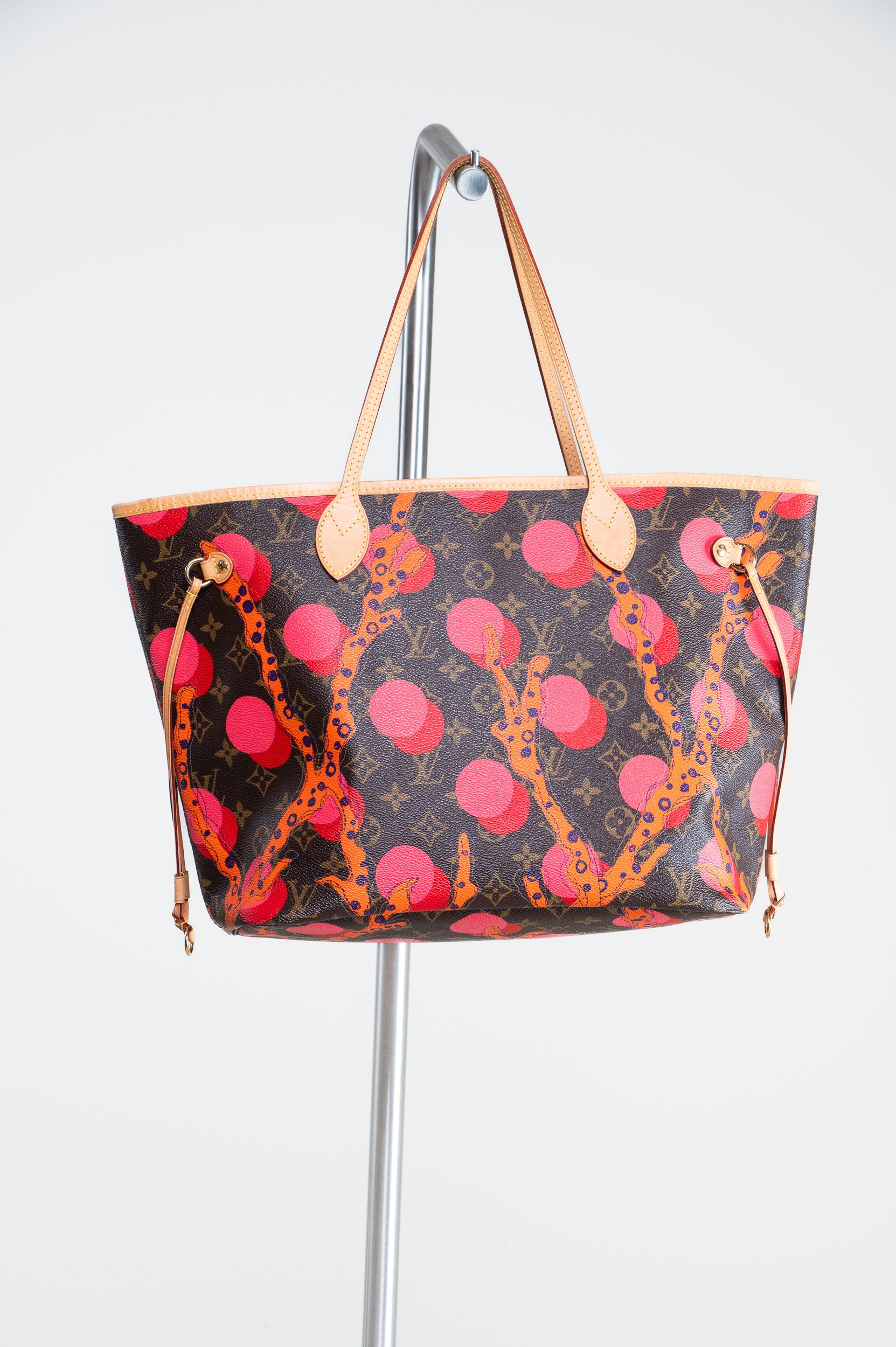 Front view of Louis Vuitton Ramage Print Neverfull MM