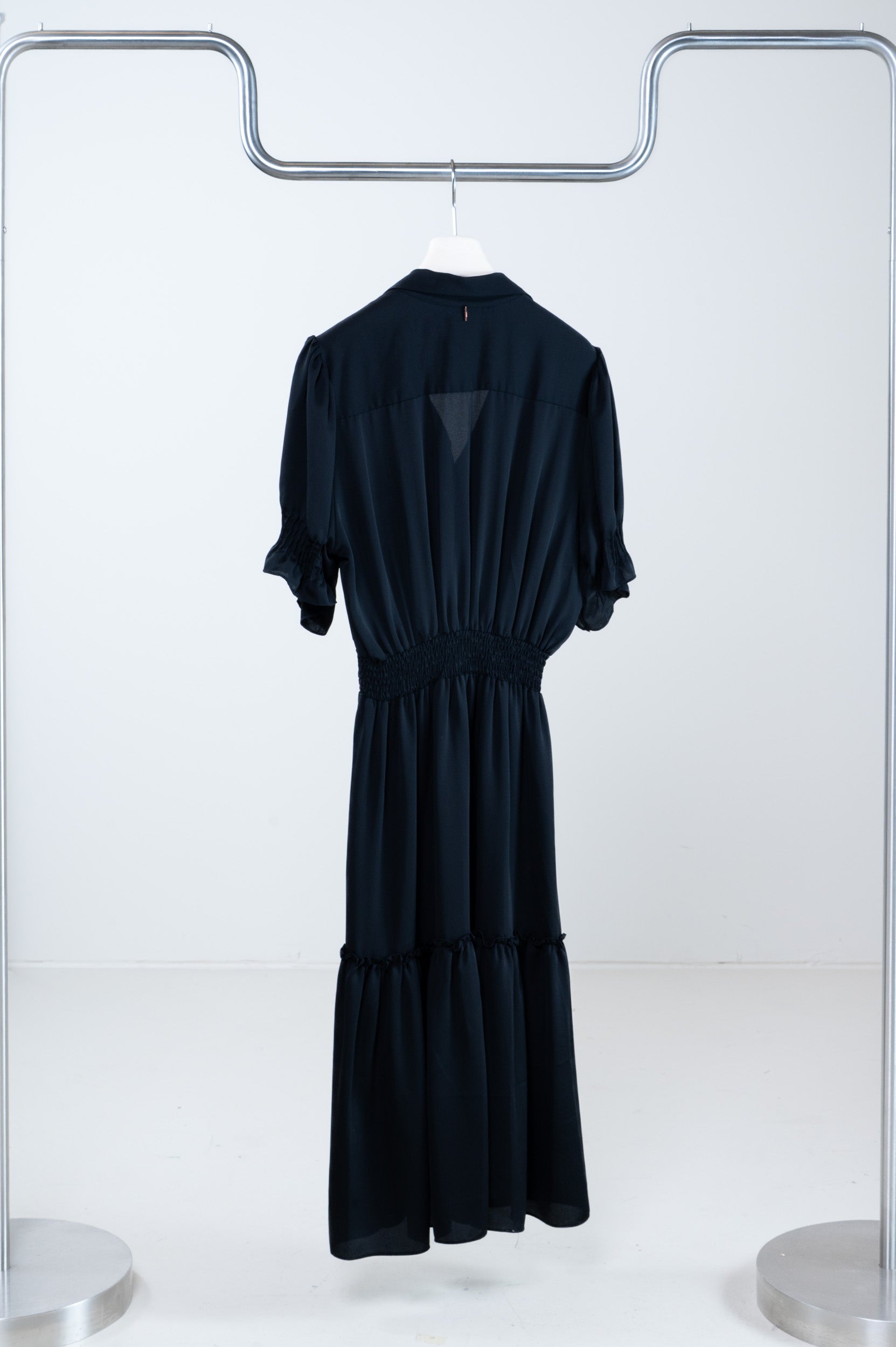 Back view of Misa Black Uma Midi Dress showing full silhouette