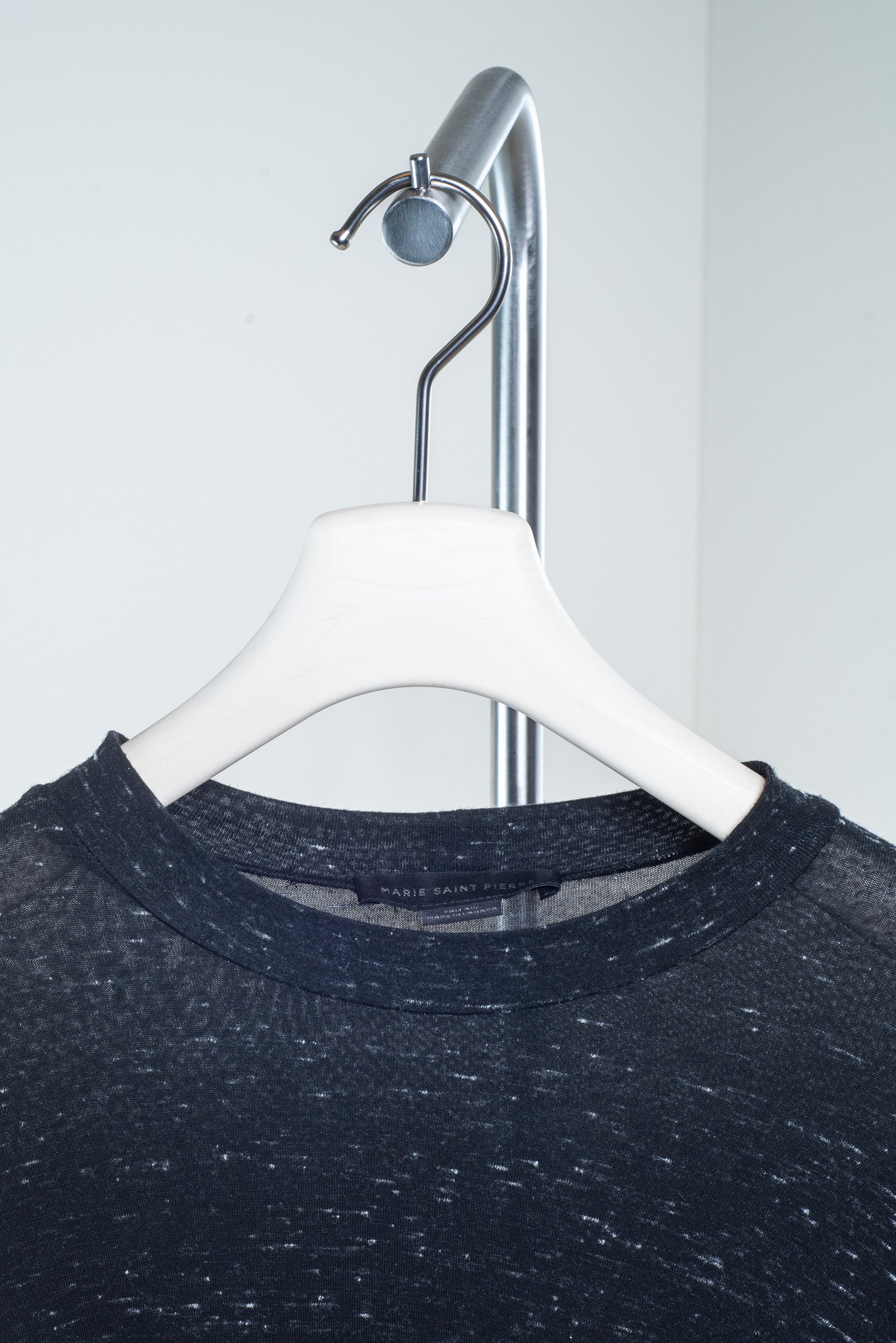 Close-up view of Marie Saint Pierre Black Speckled Long-Sleeve Shirt 